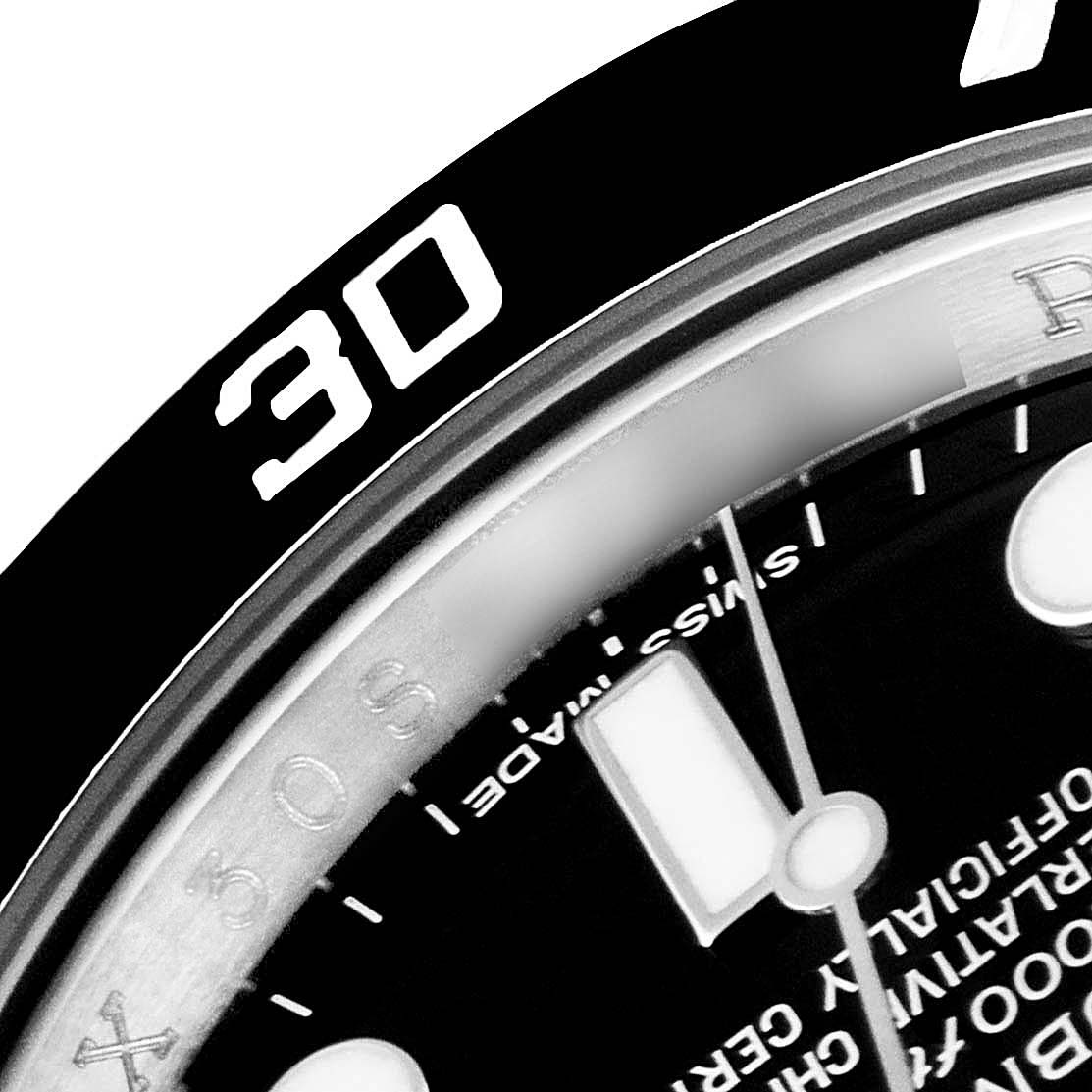 Close-up of the Rolex Submariner 116610 Men's Stainless Steel Black Dial 116610 Men's Stainless Steel Black Dial showing the bezel with "30" marking and part of the dial and text.