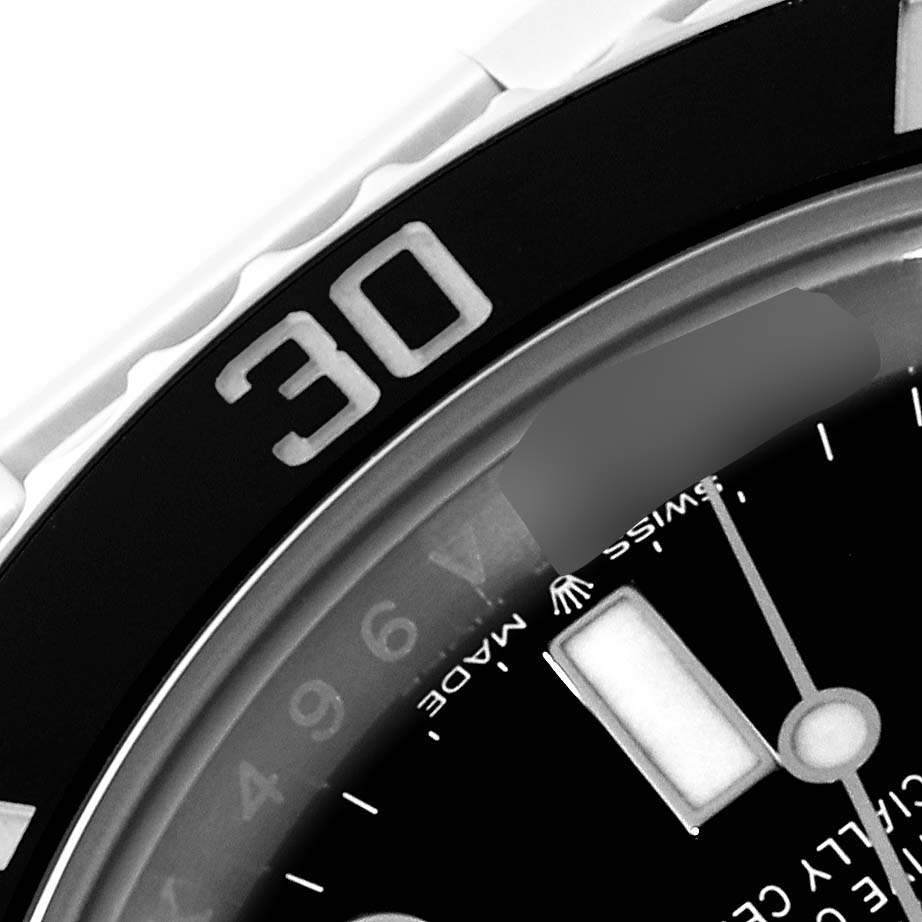 The close-up image showcases the bezel, indices, and part of the dial of a Rolex Submariner 124060 Men
s Stainless Steel Black Dial 124060 Men
s Stainless Steel Black Dial watch.