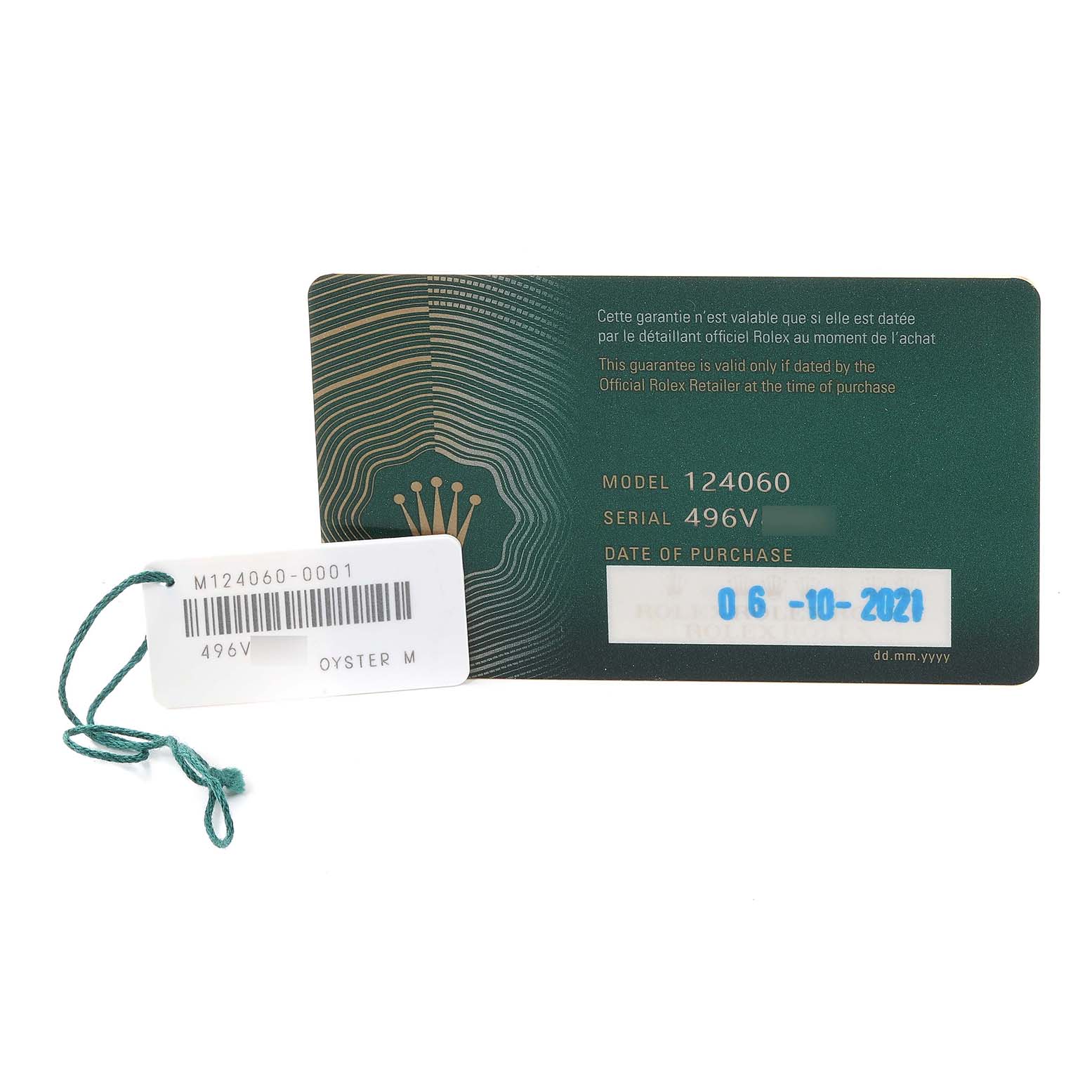The image shows the warranty card and tag for a Rolex Submariner 124060 Men
s Stainless Steel Black Dial 124060 Men
s Stainless Steel Black Dial model 124060.