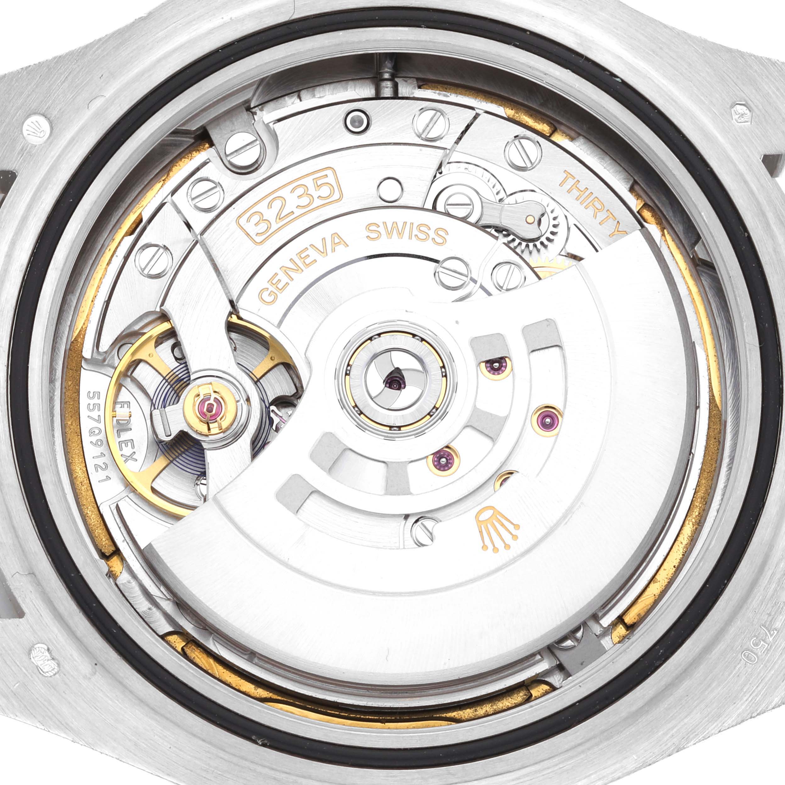 This is a close-up view of the movement mechanism inside a Rolex Yacht-Master 226659 Men
s White Gold Black Dial 226659 Men
s White Gold Black Dial watch.