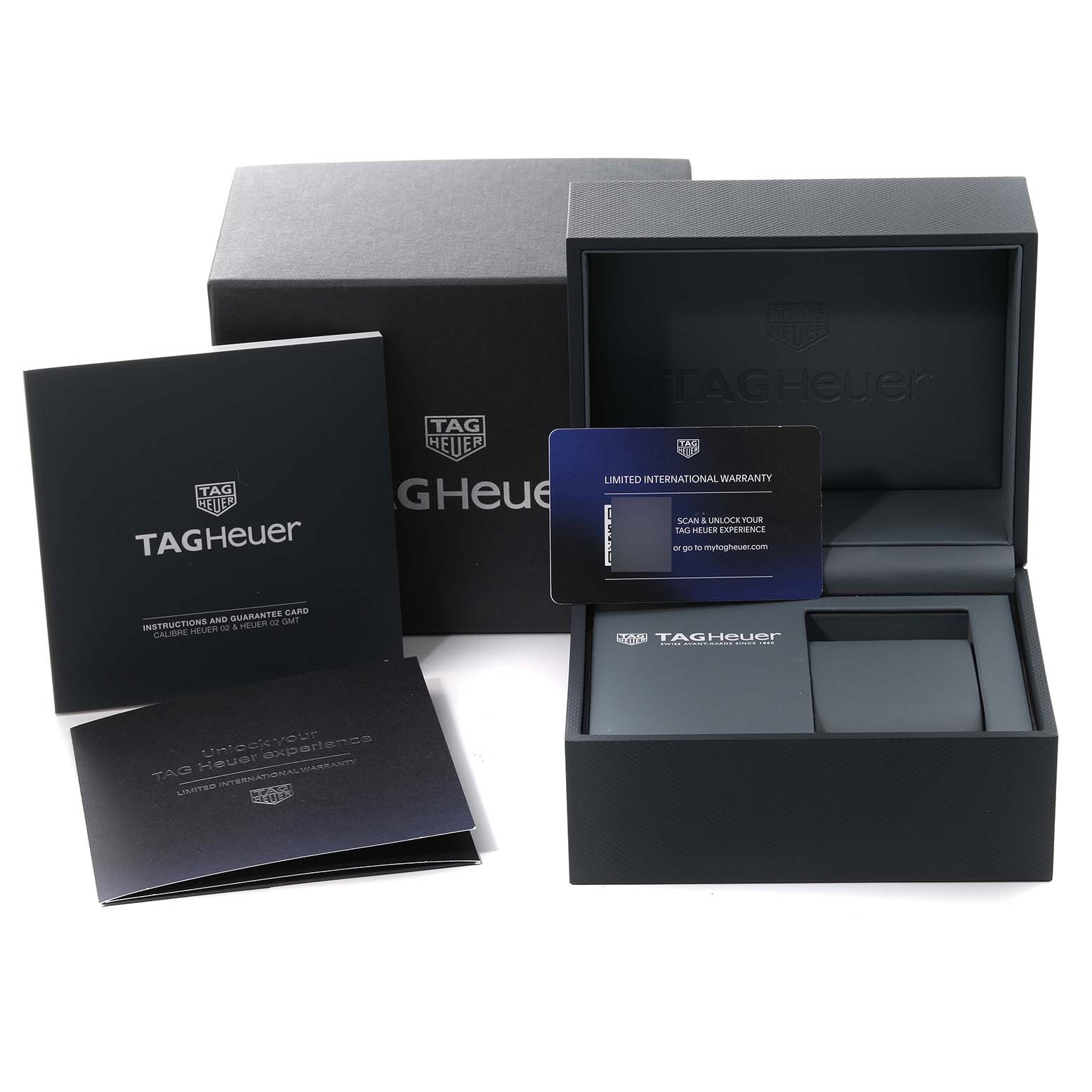 This image shows the packaging, instruction booklets, and warranty card for the Tag Heuer Carrera CBN201D.FC6543 Men's Stainless Steel Blue Dial CBN201D.FC6543 Men's Stainless Steel Blue Dial model watch.