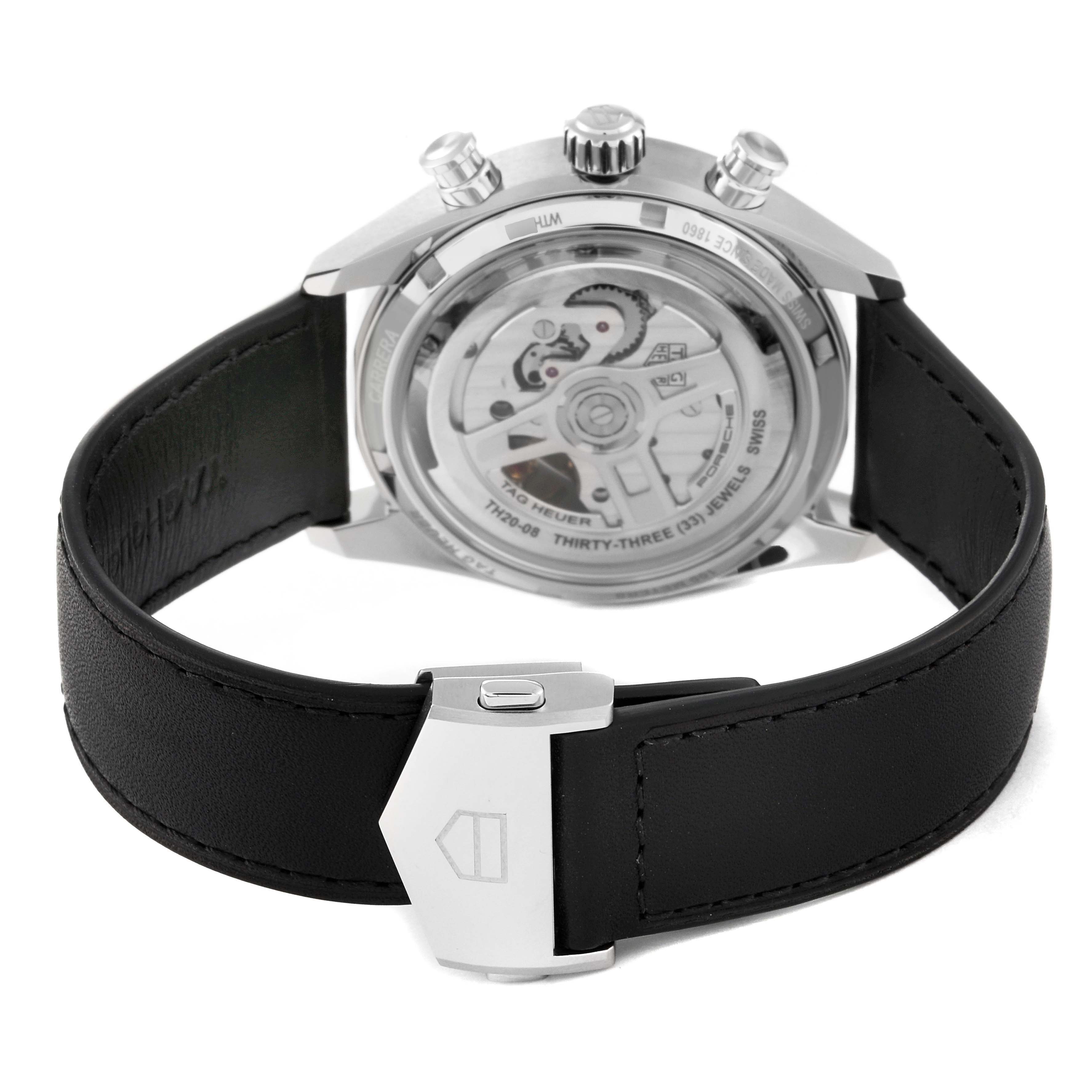 This image shows the Tag Heuer Carrera CBS2011.FC6529 Men's Stainless Steel Silver Dial CBS2011.FC6529 Men's Stainless Steel Silver Dial watch from the back, displaying its movement and leather strap.
