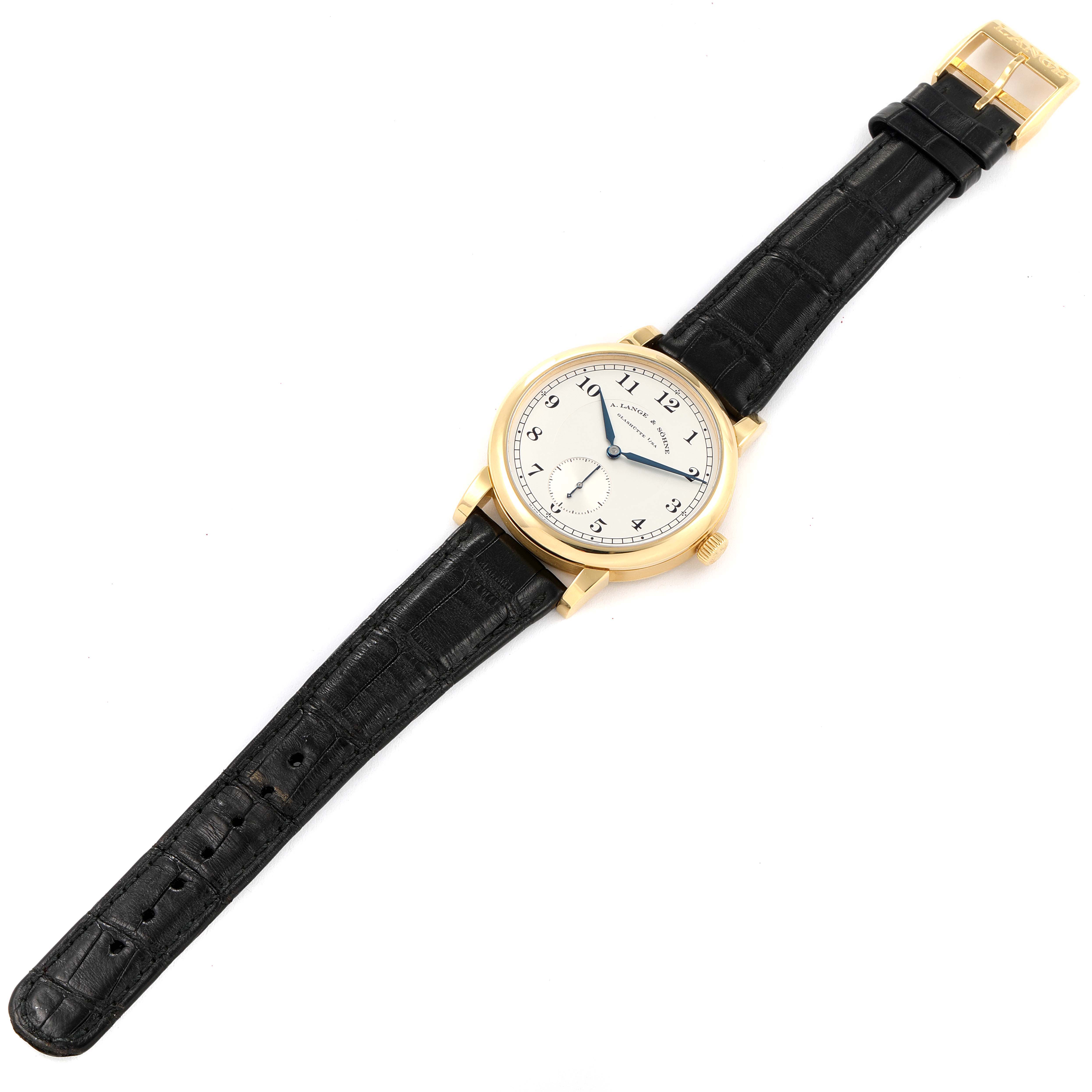 This A. Lange & Sohne 1815 233.021 Men's Yellow Gold Silver Dial model is shown from a top-down angle, displaying the watch face, black strap, and gold buckle.