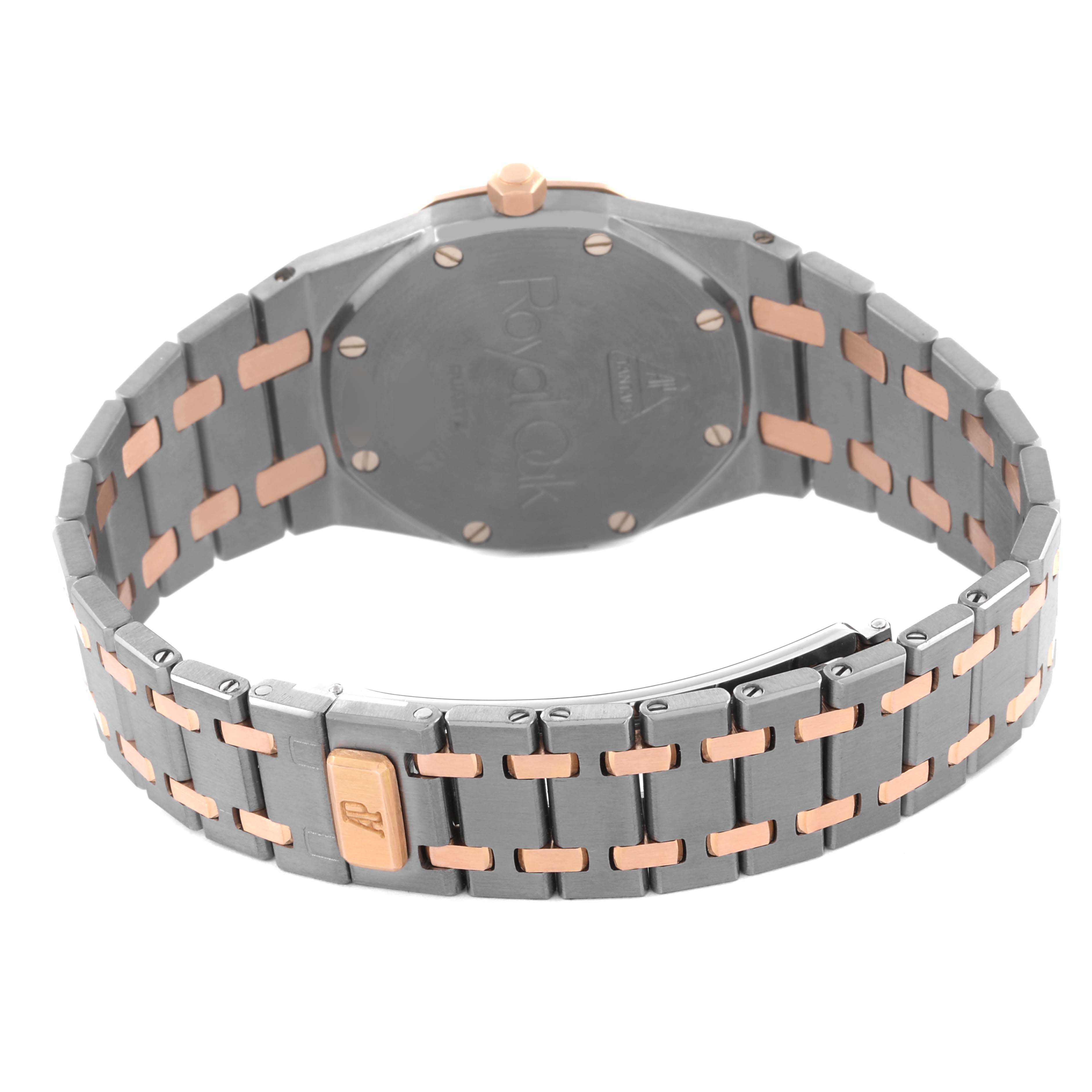 The image shows the back and bracelet of the Audemars Piguet Royal Oak 56175TR-OO-0789TR-01 Men's Rose Gold Grey Dial 56175TR-OO-0789TR-01 Men's Rose Gold Grey Dial watch, highlighting the clasp and two-tone design.