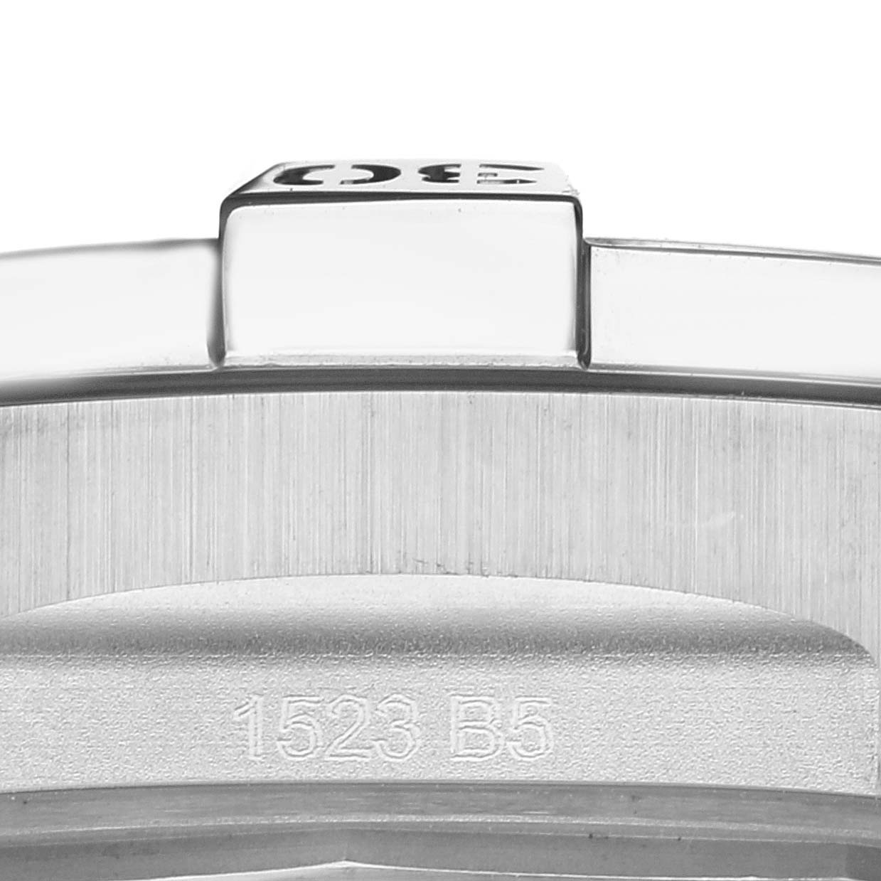 This image shows a close-up of the bezel and part of the case back of the Breitling Avenger A32395 Men's Stainless Steel Blue Dial A32395 Men's Stainless Steel Blue Dial watch.