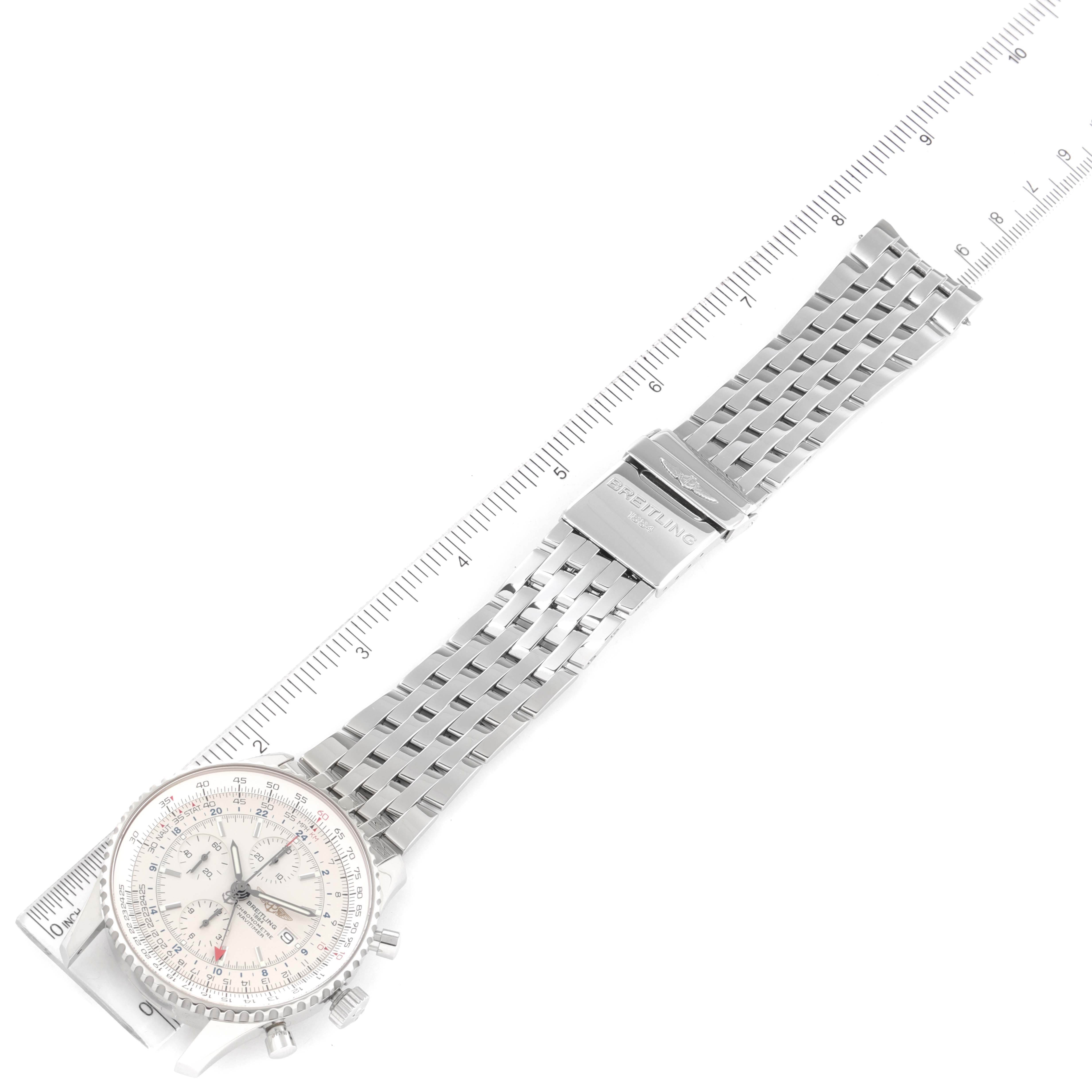 The image shows a Breitling Navitimer A24322 Men's Stainless Steel Silver Dial A24322 Men's Stainless Steel Silver Dial watch laid flat, displaying the face, bezel, crown, pushers, and metal bracelet alongside a ruler.