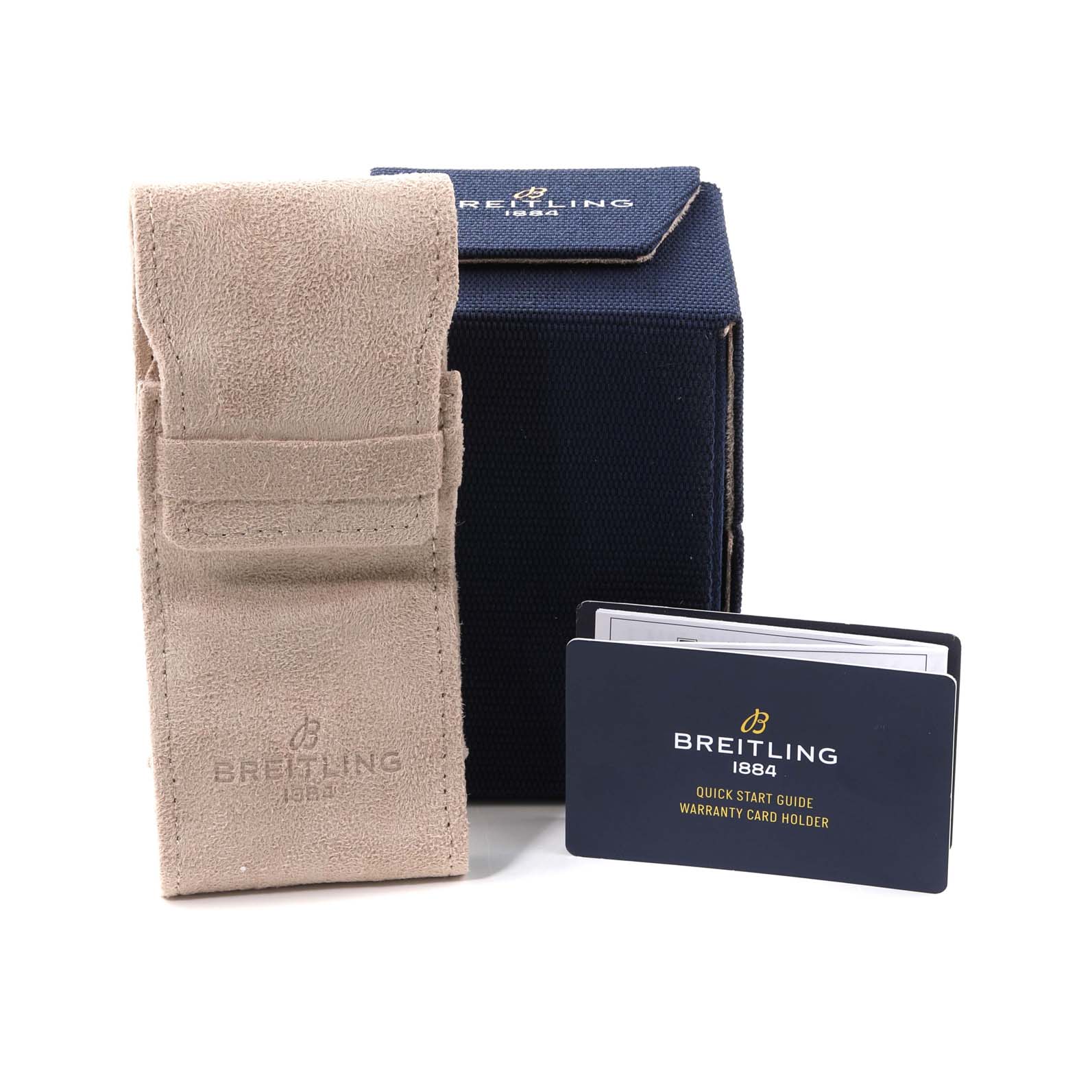 The image shows accessories for the Breitling Superocean A17375 Men's Stainless Steel White Dial A17375 Men's Stainless Steel White Dial, including a beige pouch, a navy box, and a warranty card holder.