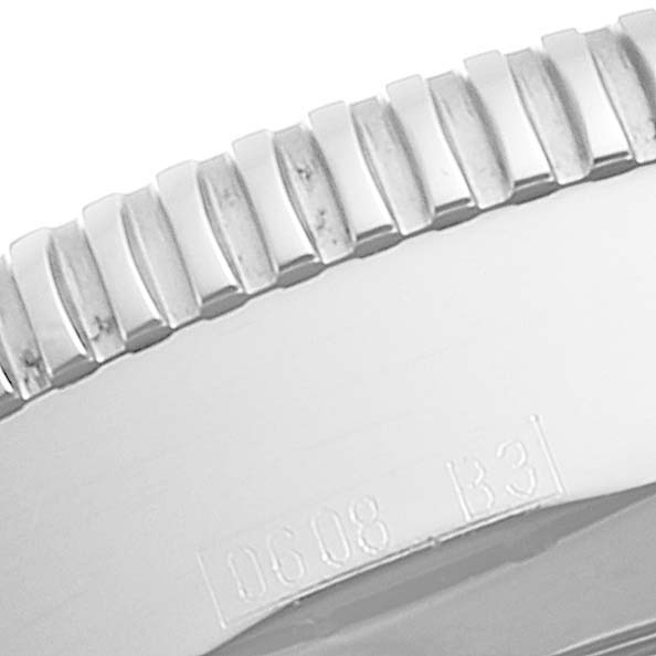 This image shows a close-up of the bezel's edge and part of the case back of a Breitling Superocean A17320 Men's Stainless Steel Black Dial A17320 Men's Stainless Steel Black Dial watch.