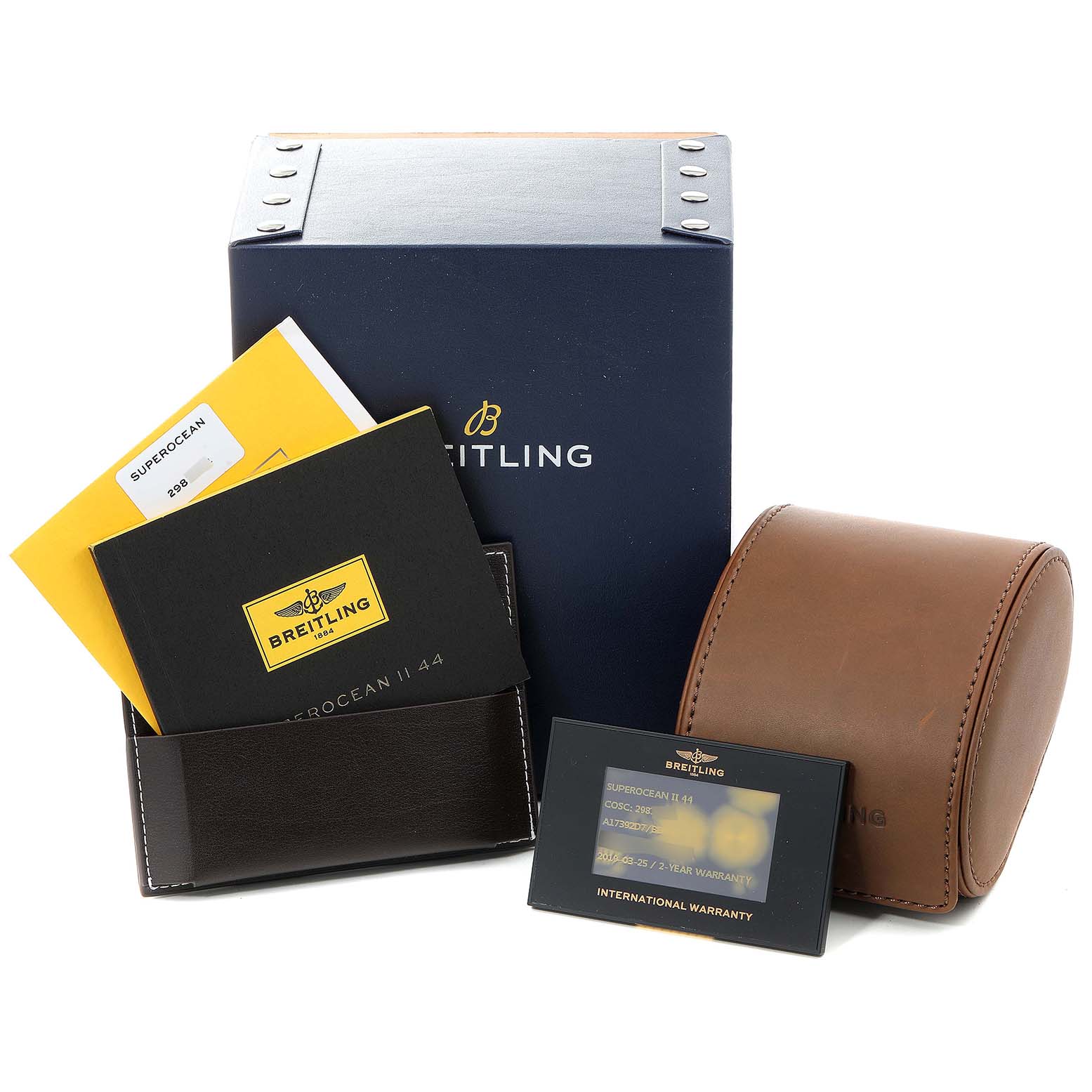 The image shows accessories for the Breitling Superocean A17392D8/C910 Men's Stainless Steel Black Dial A17392D8/C910 Men's Stainless Steel Black Dial model, including a box, leather case, manuals, and an international warranty card.