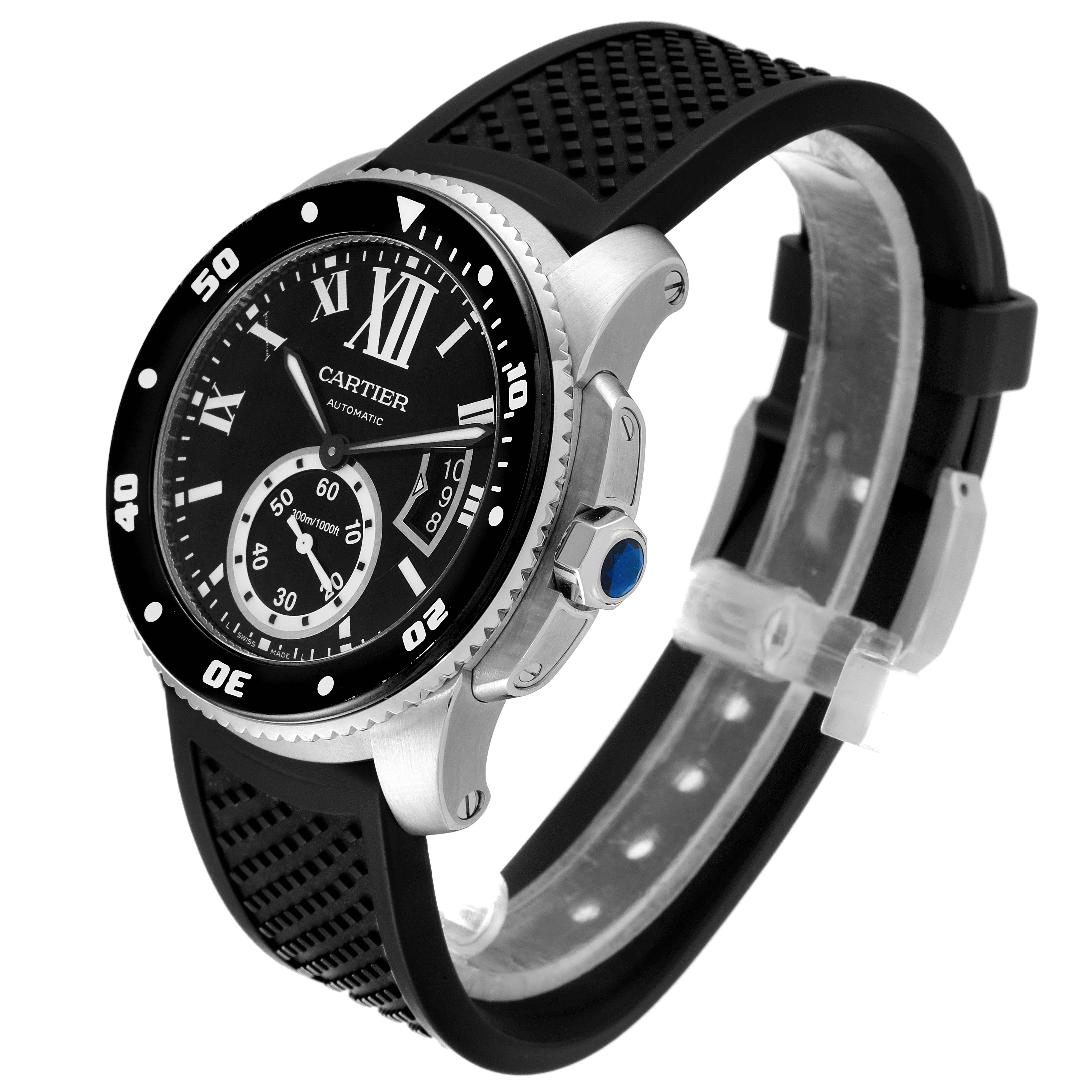 The image shows a Calibre de Cartier watch by Cartier at an angle highlighting its face, bezel, crown, and strap.