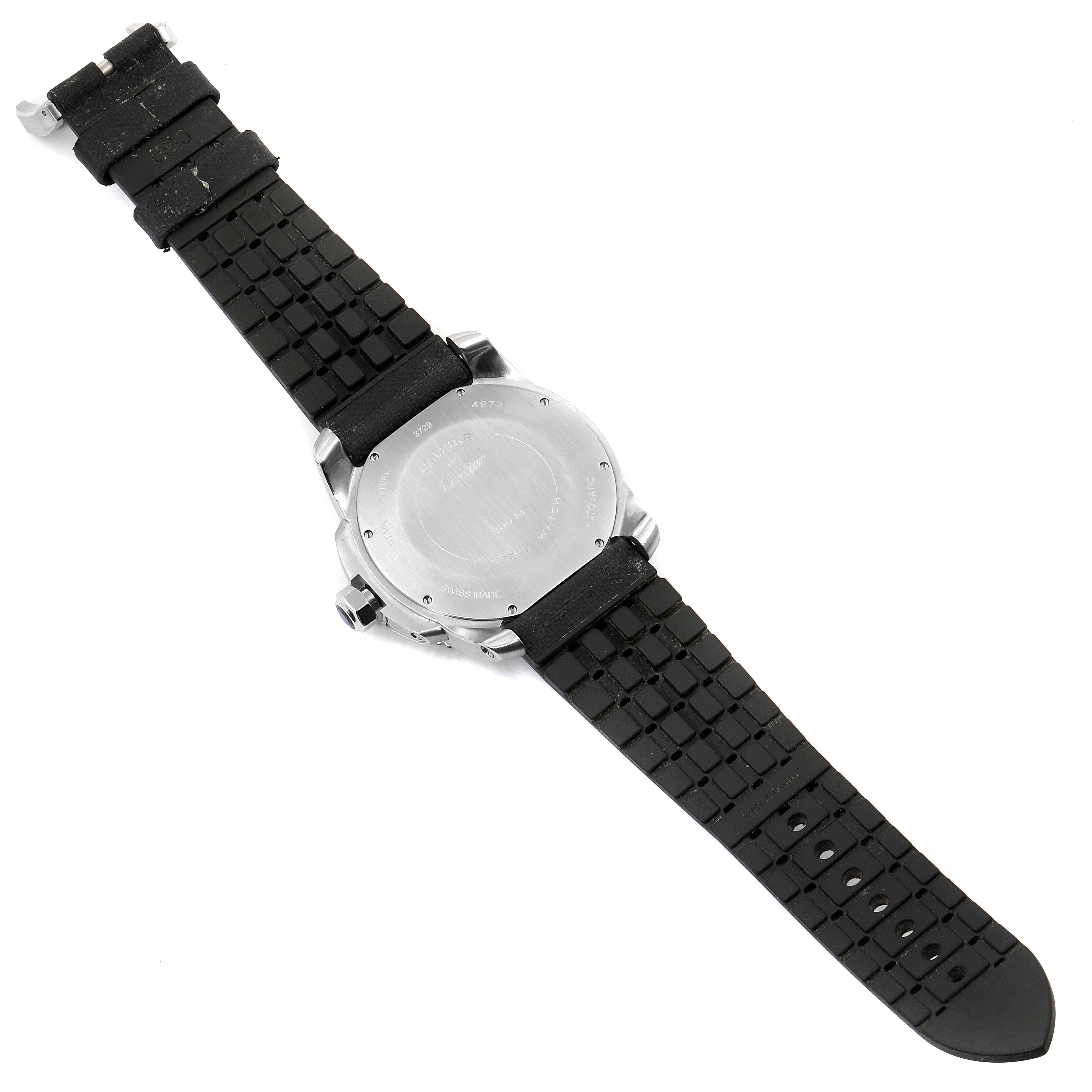 The image shows the back case and strap of a Calibre de Cartier watch by Cartier, viewed from the backside.