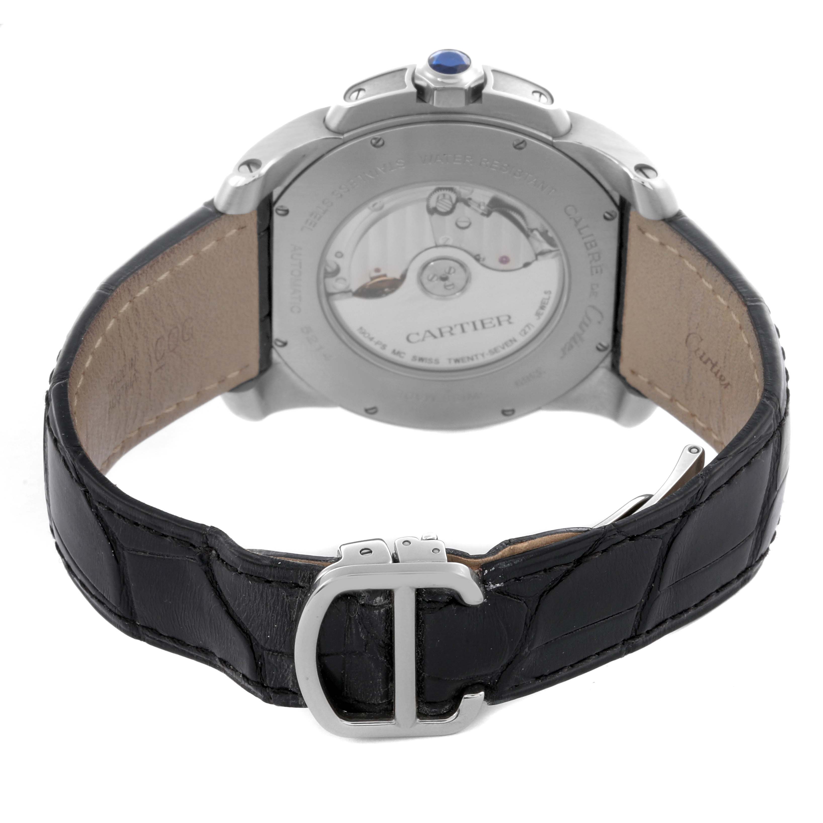 The image shows the back of the Calibre de Cartier watch and its strap, highlighting the case back and buckle.