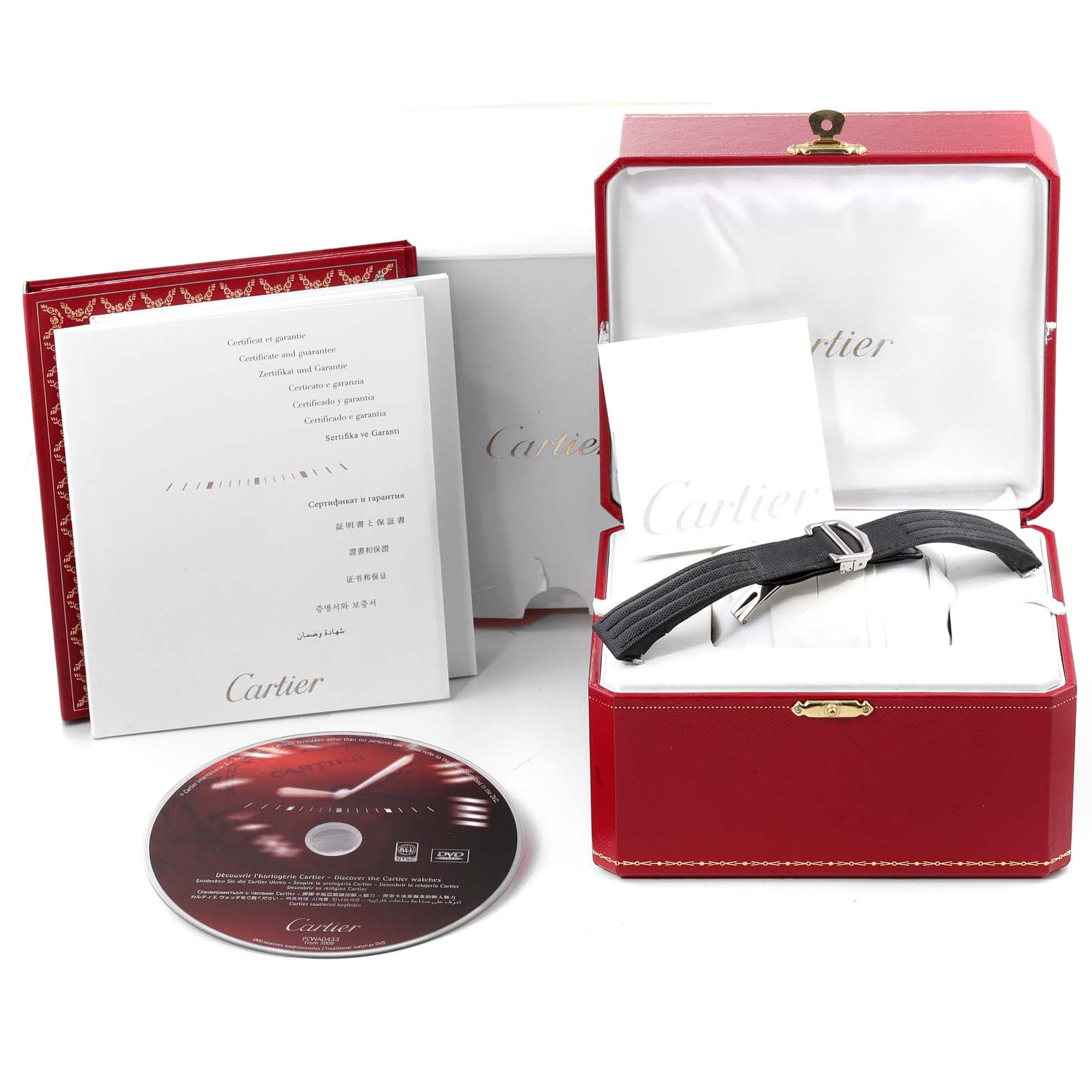 The image shows a Cartier Roadster W62019X6 Men's Stainless Steel Silver Dial W62019X6 Men's Stainless Steel Silver Dial watch in its open red box, along with booklets and a CD, viewed from an overhead angle.