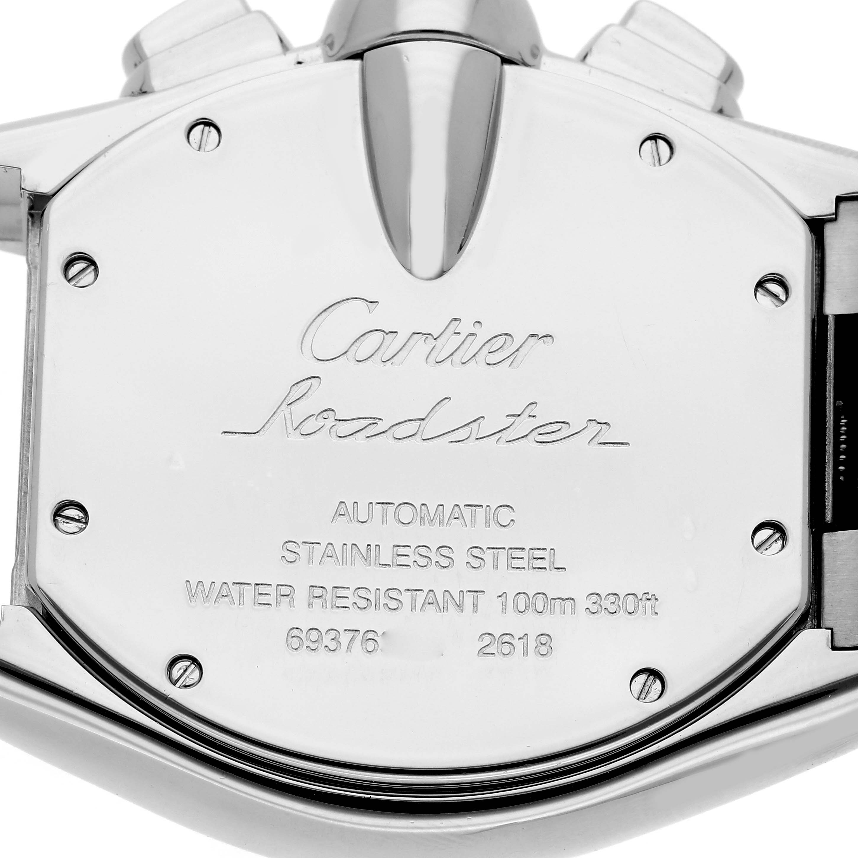 The image shows the stainless steel back case of a Cartier Roadster W62020X6 Men's Stainless Steel Black Dial W62020X6 Men's Stainless Steel Black Dial watch with engraved details.