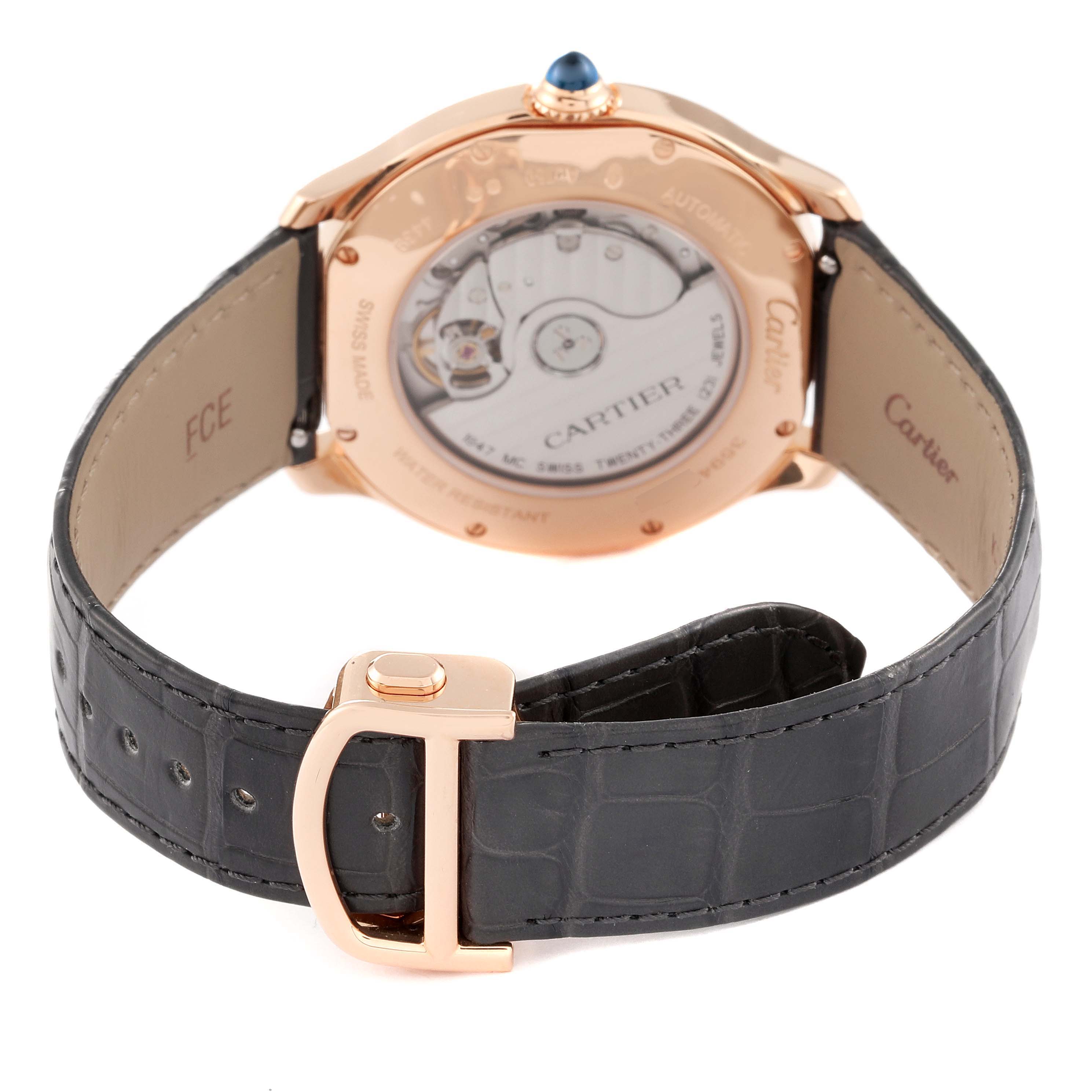 The image shows the back of a Cartier Ronde WGRN0011 Men
s Rose Gold Silver Dial WGRN0011 Men
s Rose Gold Silver Dial watch, highlighting the strap, buckle, and transparent case back.