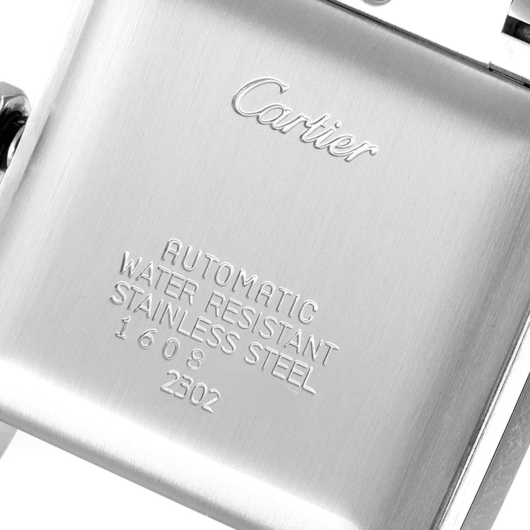 The image shows the case back of the Cartier Tank Francaise W51002Q3 Men's Stainless Steel Silver Dial W51002Q3 Men's Stainless Steel Silver Dial watch, displaying the brand name and specifications.