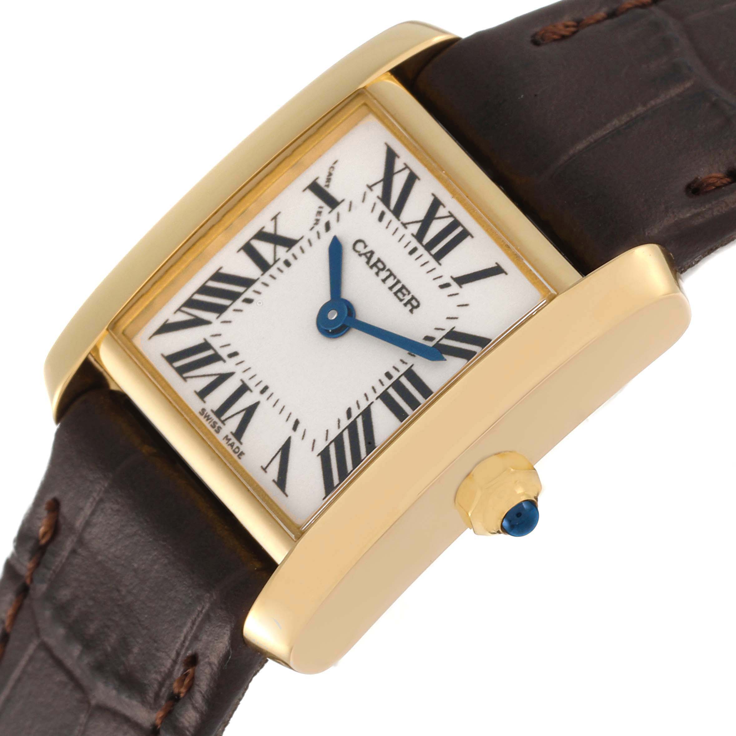 The image shows a close-up angled view of a Tank Francaise watch by Cartier, highlighting the face, case, and part of the leather strap.