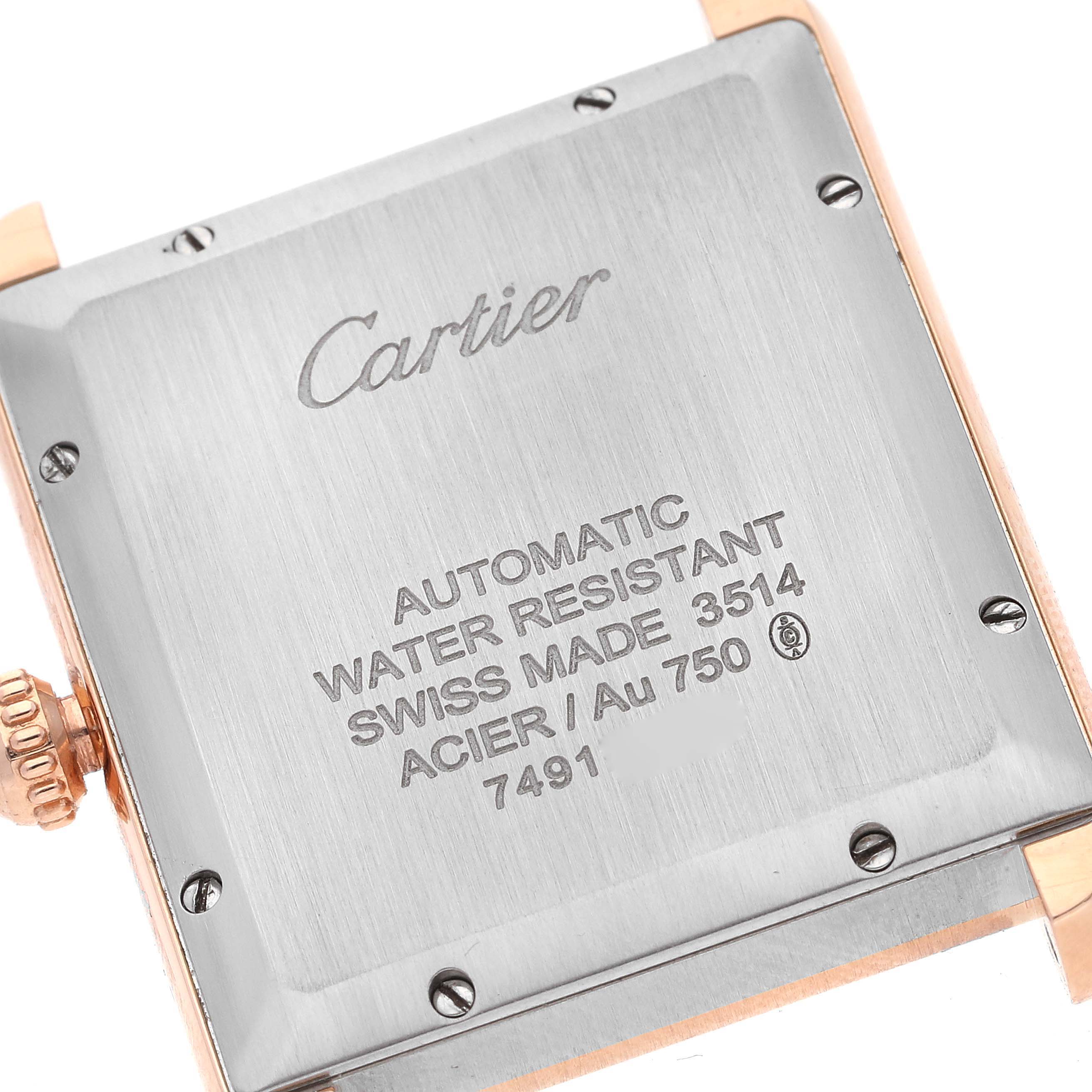 This image shows the back case of a Cartier Tank Solo W5200026 Men
s Rose Gold Silver Dial W5200026 Men
s Rose Gold Silver Dial watch, displaying engravings and screw details.