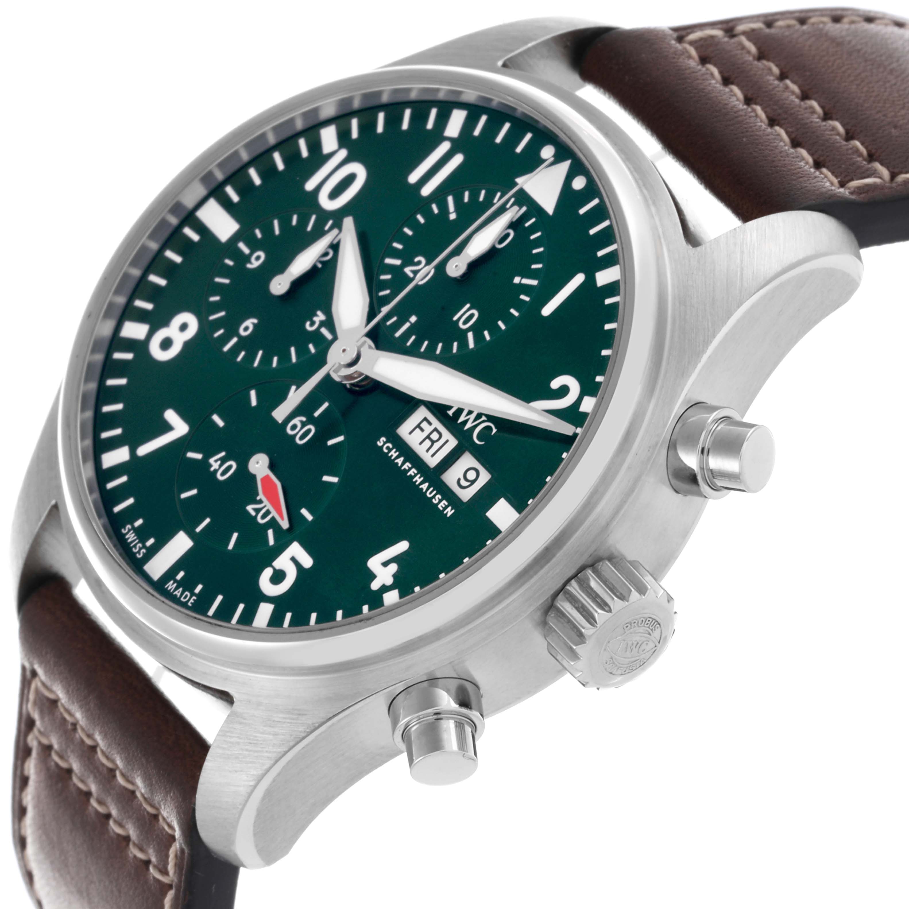 The IWC Pilot IW388103 Men's Stainless Steel Green Dial IW388103 Men's Stainless Steel Green Dial model watch is shown at a three-quarter angle, highlighting the face, crown, pushers, and brown leather strap.