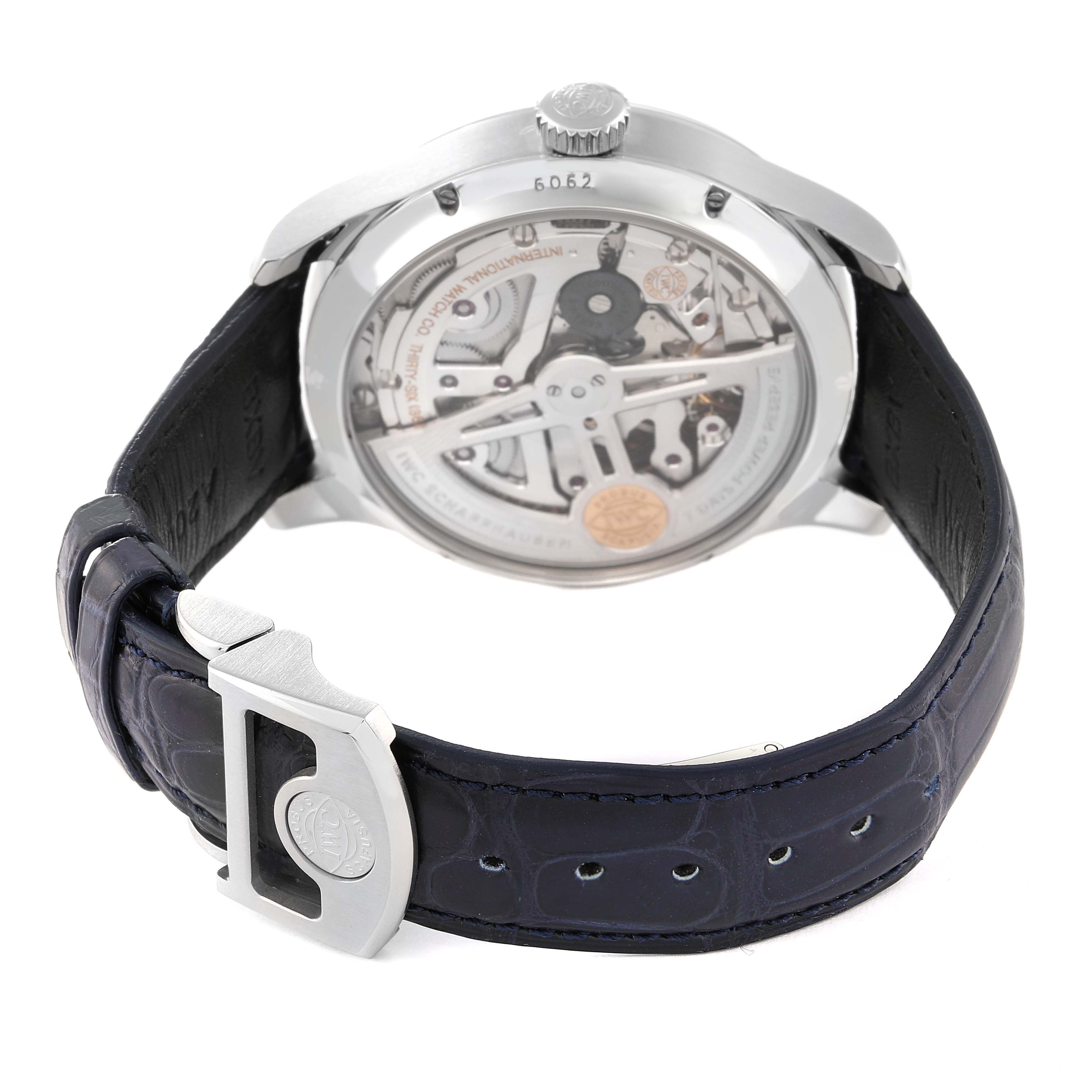 The image shows the back view of an IWC Portuguese IW503502 Men's Stainless Steel Blue Dial IW503502 Men's Stainless Steel Blue Dial watch, displaying its intricate movement and leather strap.