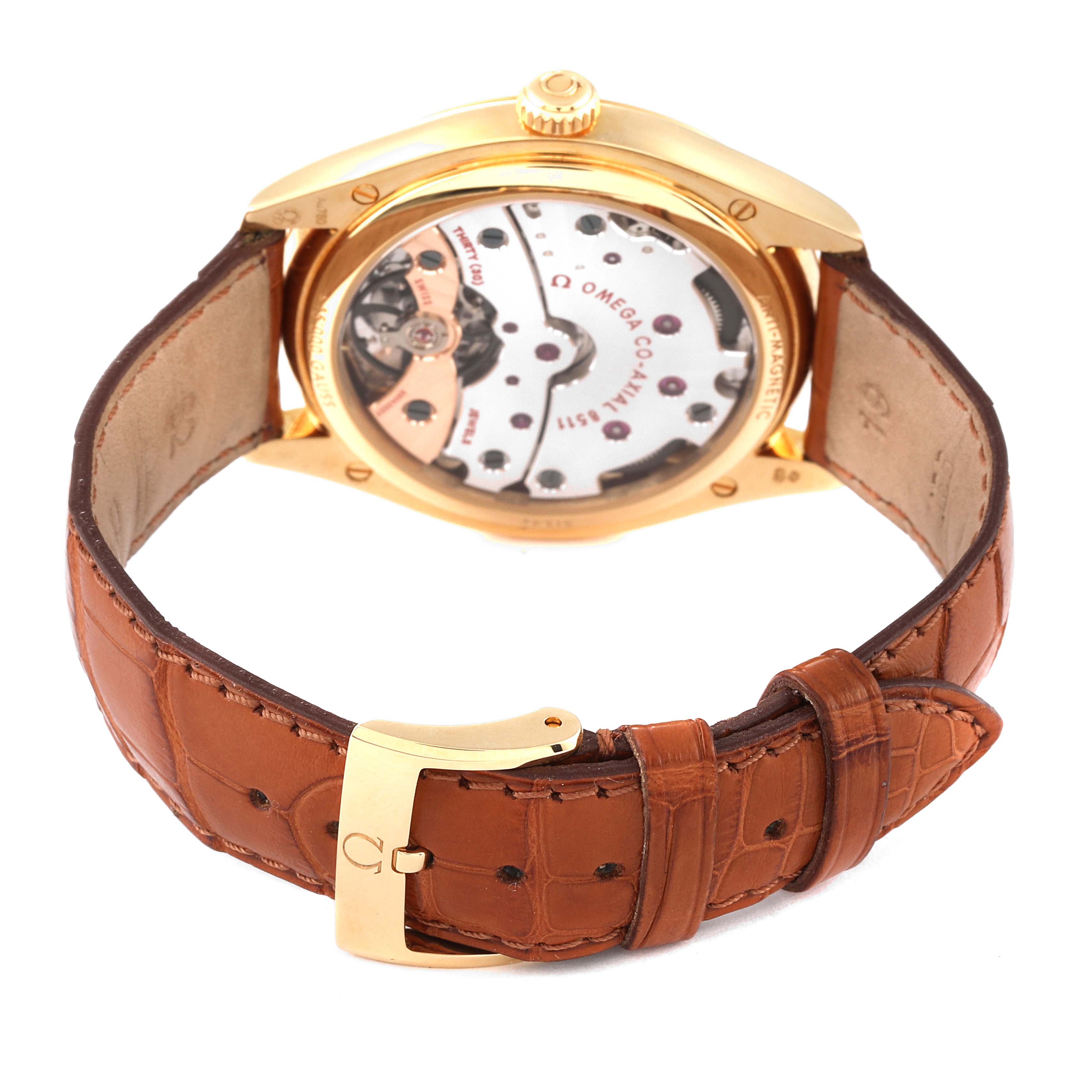 This image shows the back of the Omega De Ville 432.53.40.21.02.001 Men's Yellow Gold Silver Dial 432.53.40.21.02.001 Men's Yellow Gold Silver Dial watch, revealing its movement and brown leather strap with a gold buckle.