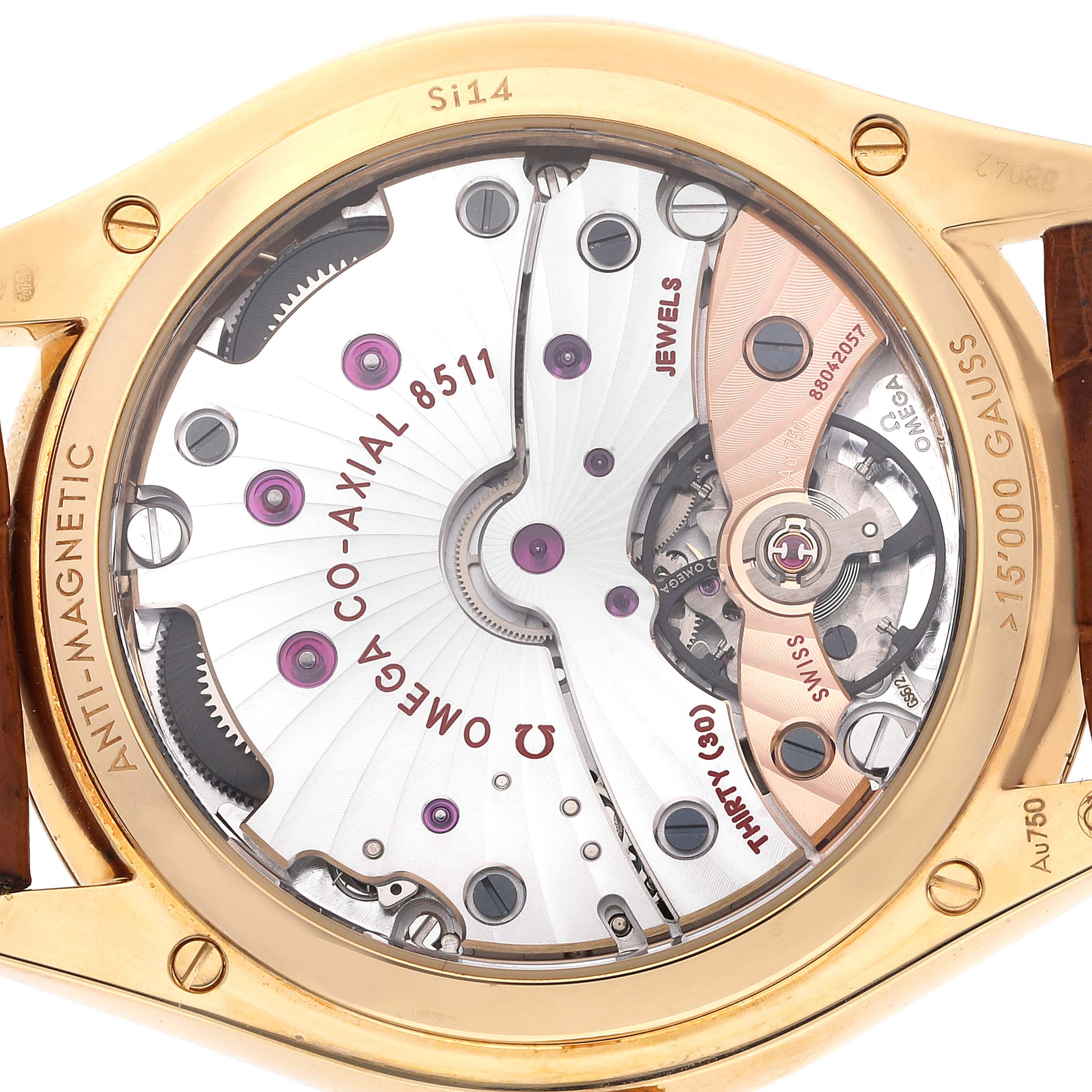 This image shows the back of the Omega De Ville 432.53.40.21.02.001 Men's Yellow Gold Silver Dial 432.53.40.21.02.001 Men's Yellow Gold Silver Dial watch, highlighting its intricate movement and anti-magnetic properties.