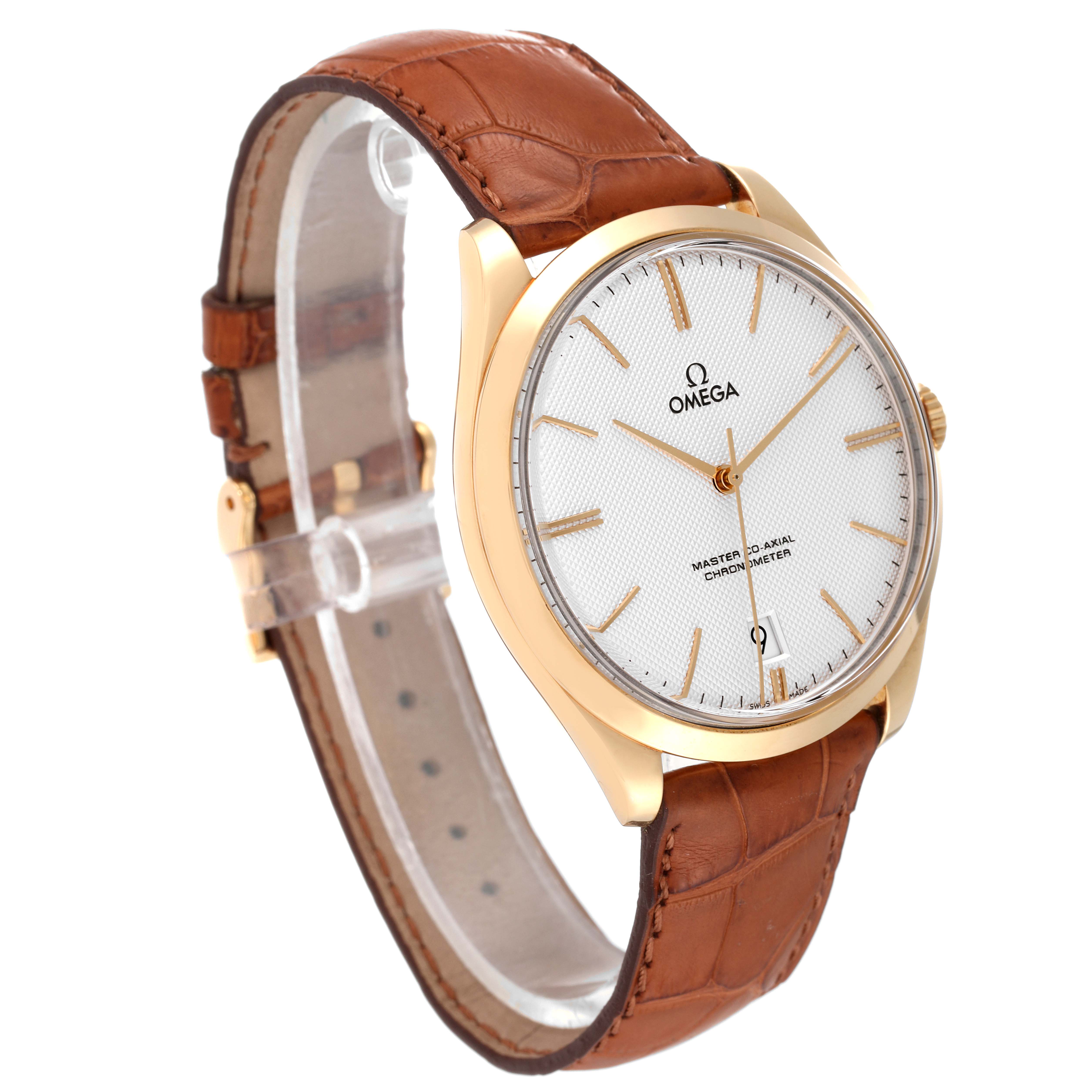 The image shows an angled view of an Omega De Ville 432.53.40.21.02.001 Men's Yellow Gold Silver Dial 432.53.40.21.02.001 Men's Yellow Gold Silver Dial watch, highlighting its face, leather strap, and gold casing.