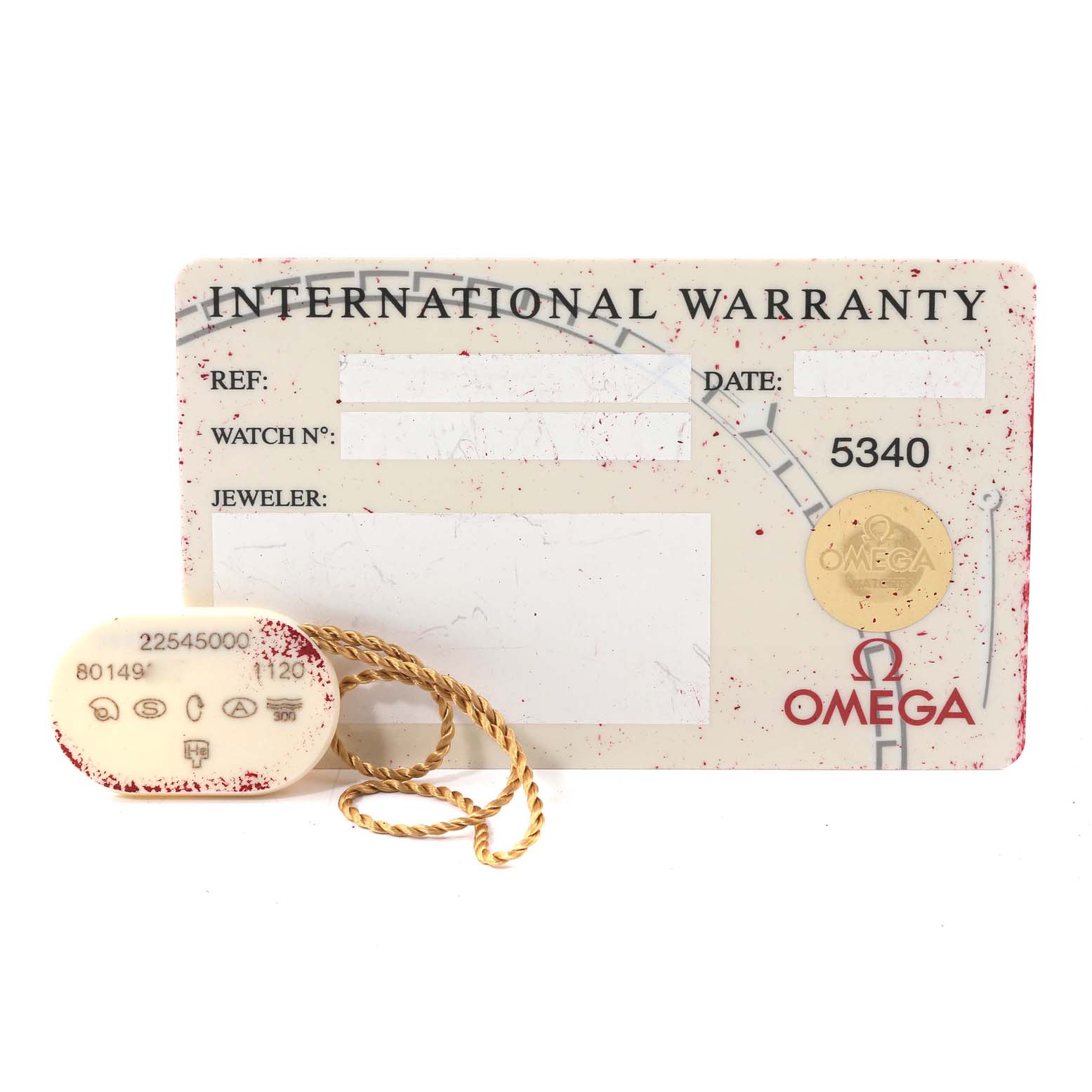 The image shows an Omega Seamaster 2254.50.00 Men's Stainless Steel Black Dial 2254.50.00 Men's Stainless Steel Black Dial international warranty card and a hang tag from a top-down angle.