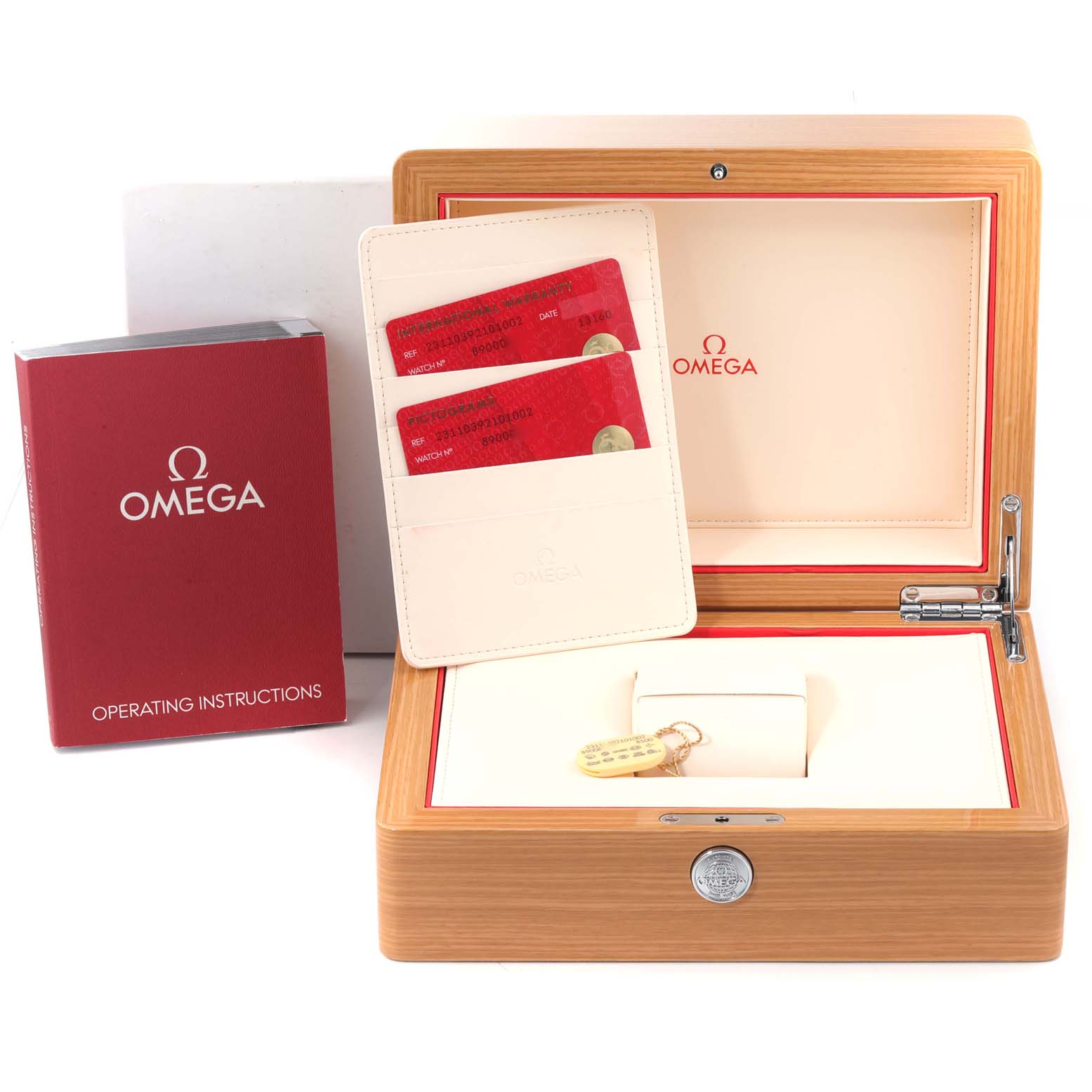 The image shows an Omega Aqua Terra 231.10.39.21.01.002 Men's Stainless Steel Black Dial 231.10.39.21.01.002 Men's Stainless Steel Black Dial watch box, instruction manual, and warranty cards from a top-down angle.