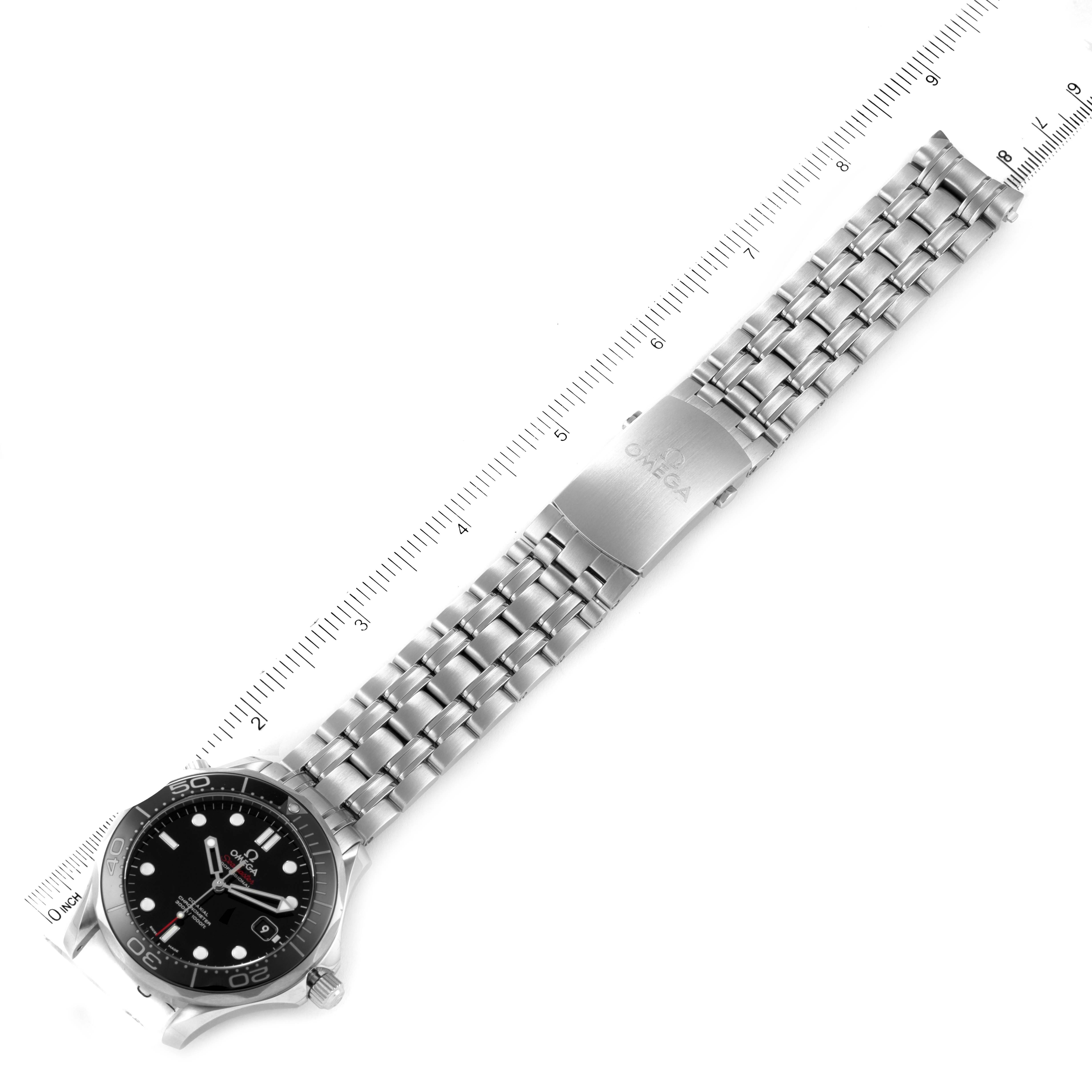 The image shows an Omega Seamaster 212.30.41.20.01.003 Men's Stainless Steel Black Dial 212.30.41.20.01.003 Men's Stainless Steel Black Dial watch with its full metal bracelet and clasp, positioned alongside a ruler.