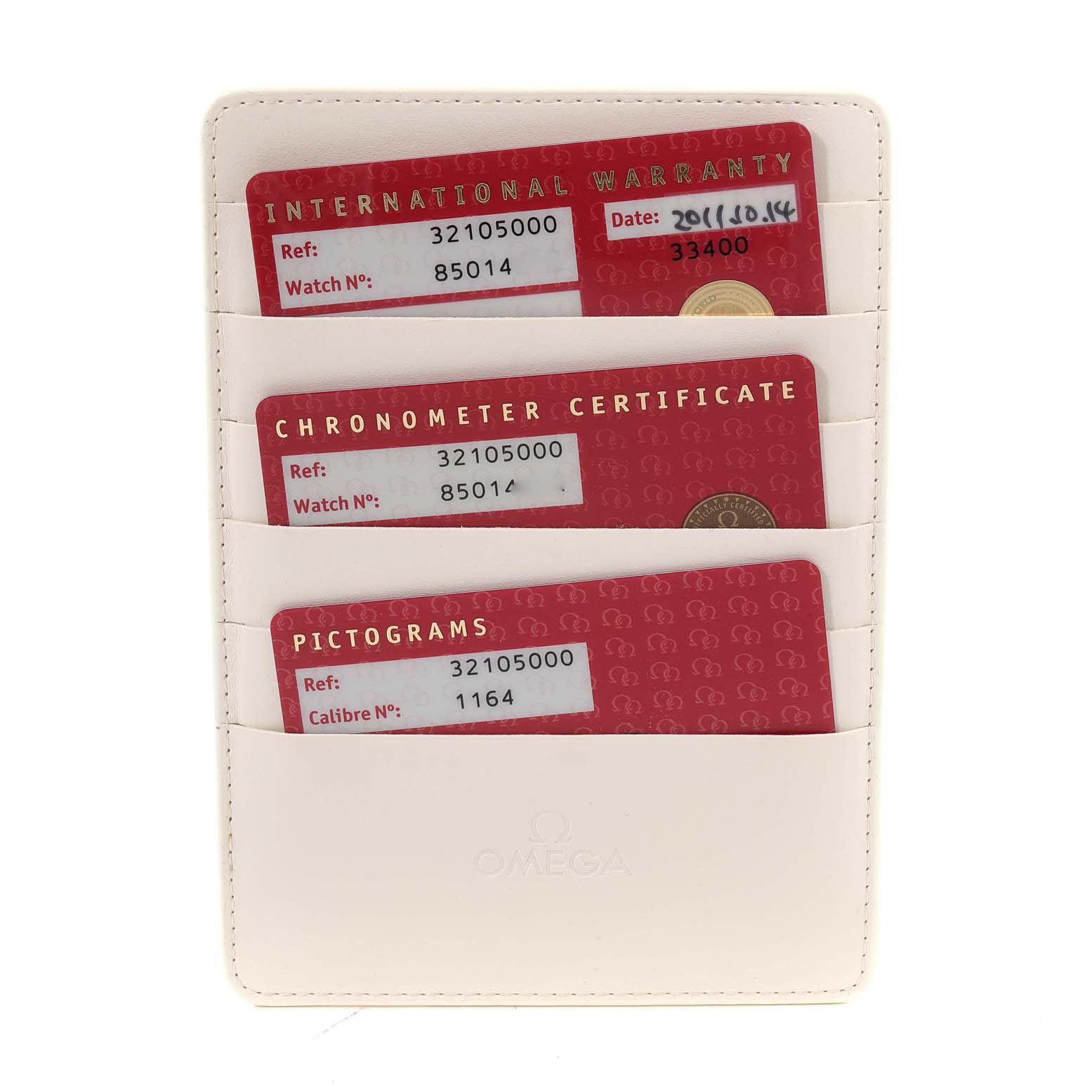 The image shows warranty, chronometer certificate, and pictograms cards for an Omega Speedmaster 3210.50.00 Men
s Stainless Steel Black Dial 3210.50.00 Men
s Stainless Steel Black Dial watch, in a beige cardholder.