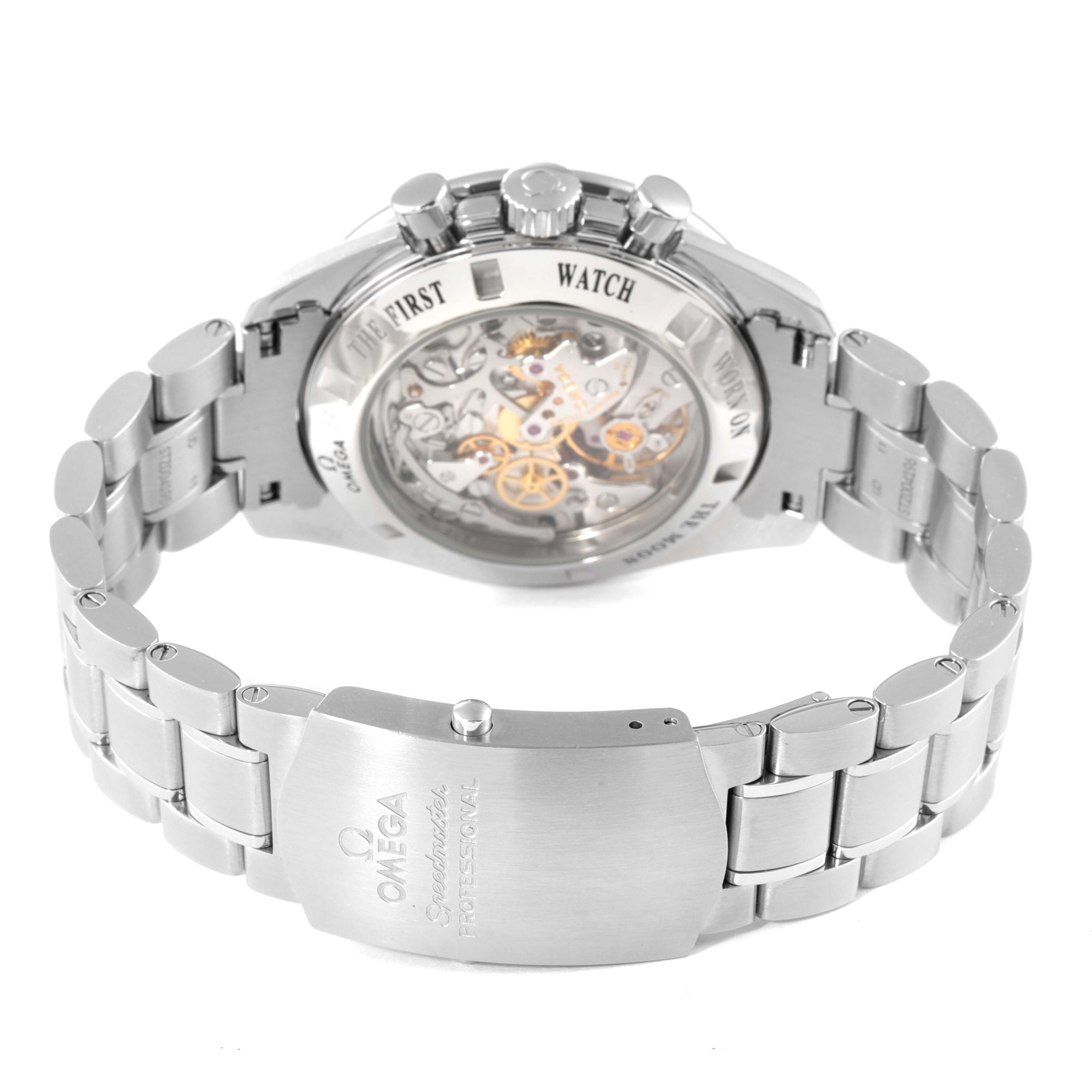 The image shows the back view of an Omega Speedmaster 311.30.42.30.01.006 Men's Stainless Steel Black Dial 311.30.42.30.01.006 Men's Stainless Steel Black Dial watch, highlighting the movement through a transparent case back and the branded bracelet clasp.