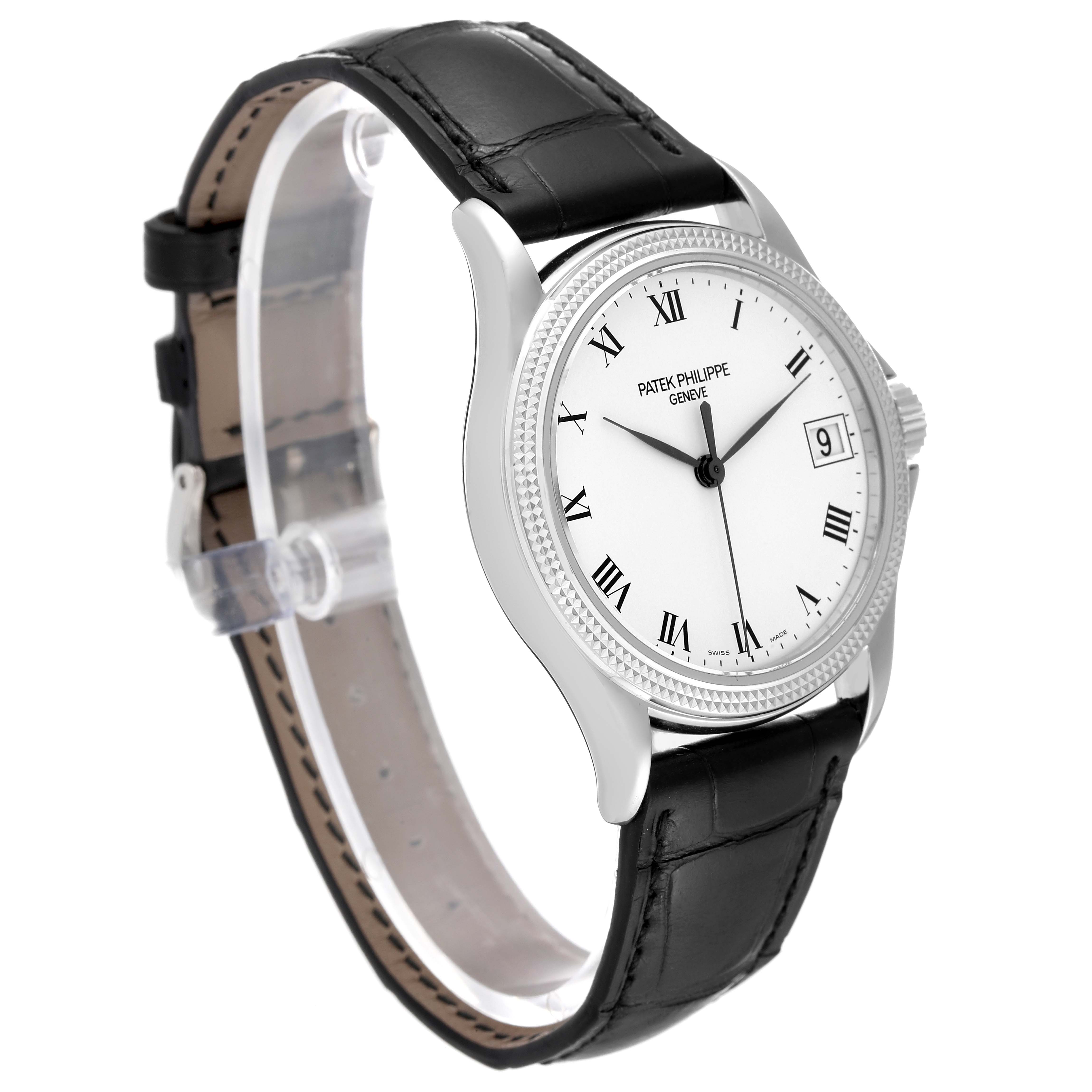 The image shows a Patek Philippe Calatrava 5117G-001 Men's White Gold White Dial 5117G-001 Men's White Gold White Dial watch at a slight angle, highlighting its face, black leather strap, and side profile.