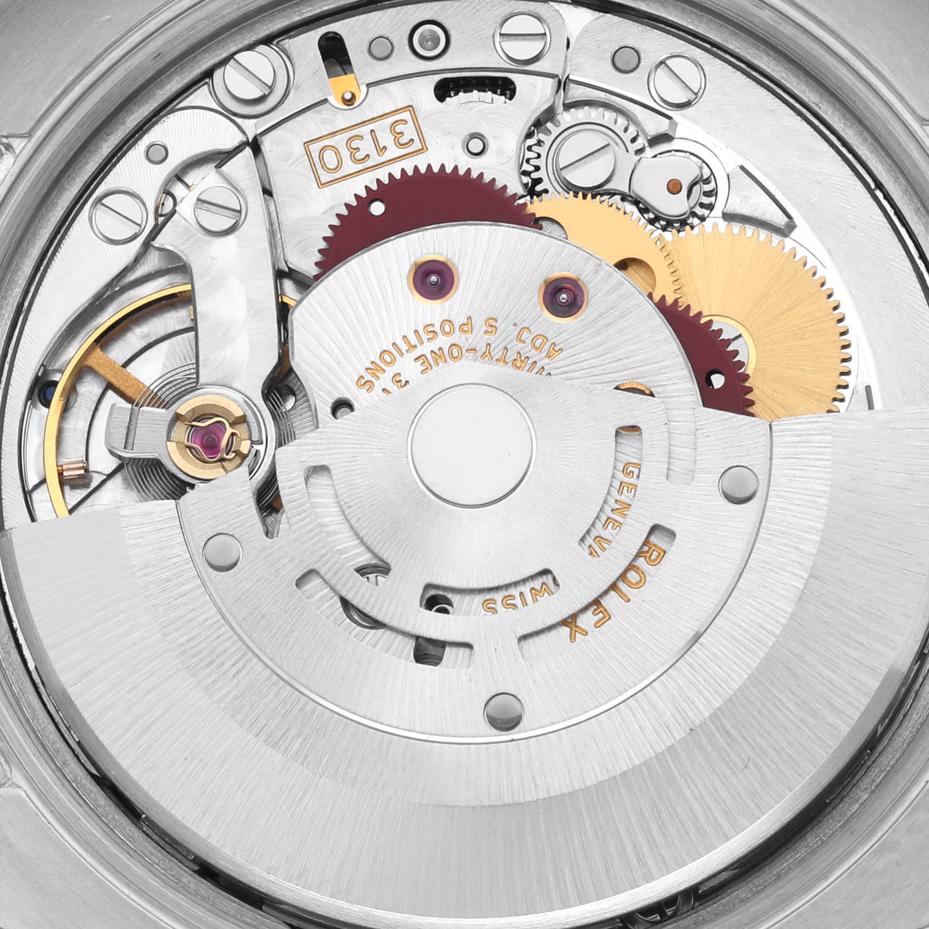 The image shows a close-up of the Rolex Air-King 114200 Men's Stainless Steel Silver Dial 114200 Men's Stainless Steel Silver Dial watch's movement from a top-down angle, highlighting its intricate gears and rotor.