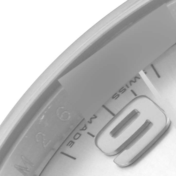 The image shows a close-up of the dial edge and numeral "9" on a Rolex Air-King 114200 Men's Stainless Steel Silver Dial 114200 Men's Stainless Steel Silver Dial watch at an oblique angle.