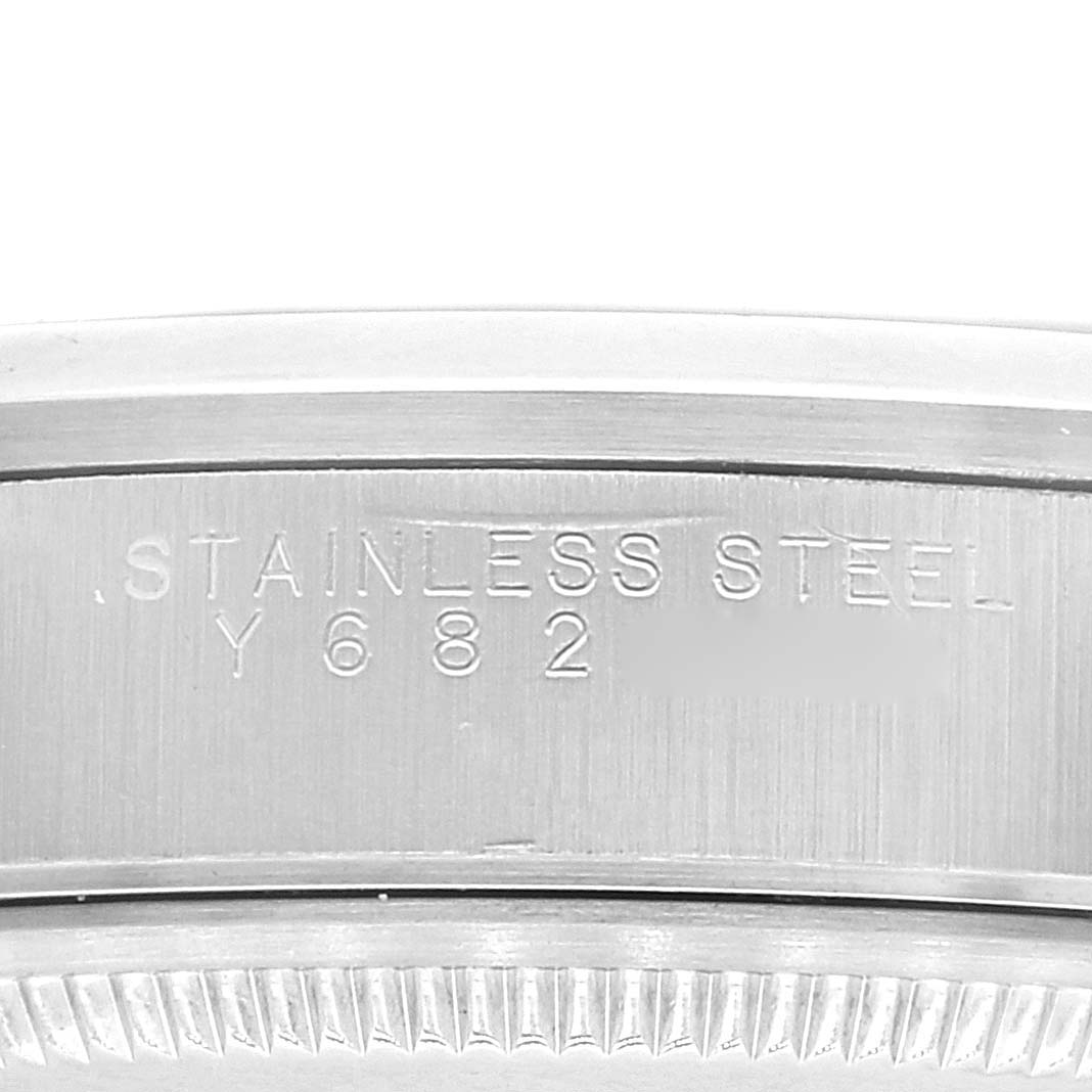 The image shows a close-up of the stainless steel case back with the engraved serial number on a Rolex Air-King 14000 Men's Stainless Steel Silver Dial 14000 Men's Stainless Steel Silver Dial watch.