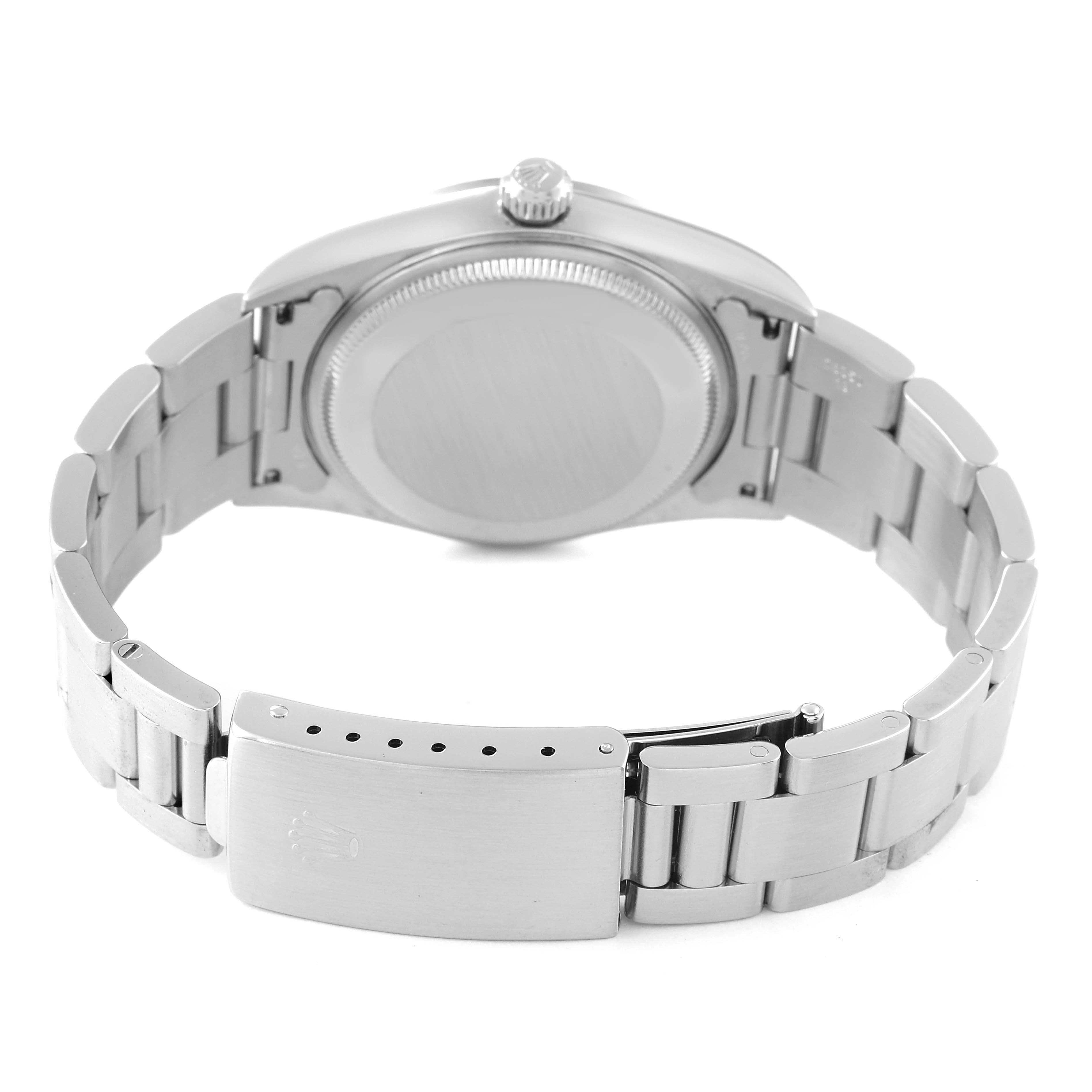 The image shows the back view of a Rolex Air-King 14000 Men's Stainless Steel Silver Dial 14000 Men's Stainless Steel Silver Dial watch, displaying the case back and the metal bracelet.