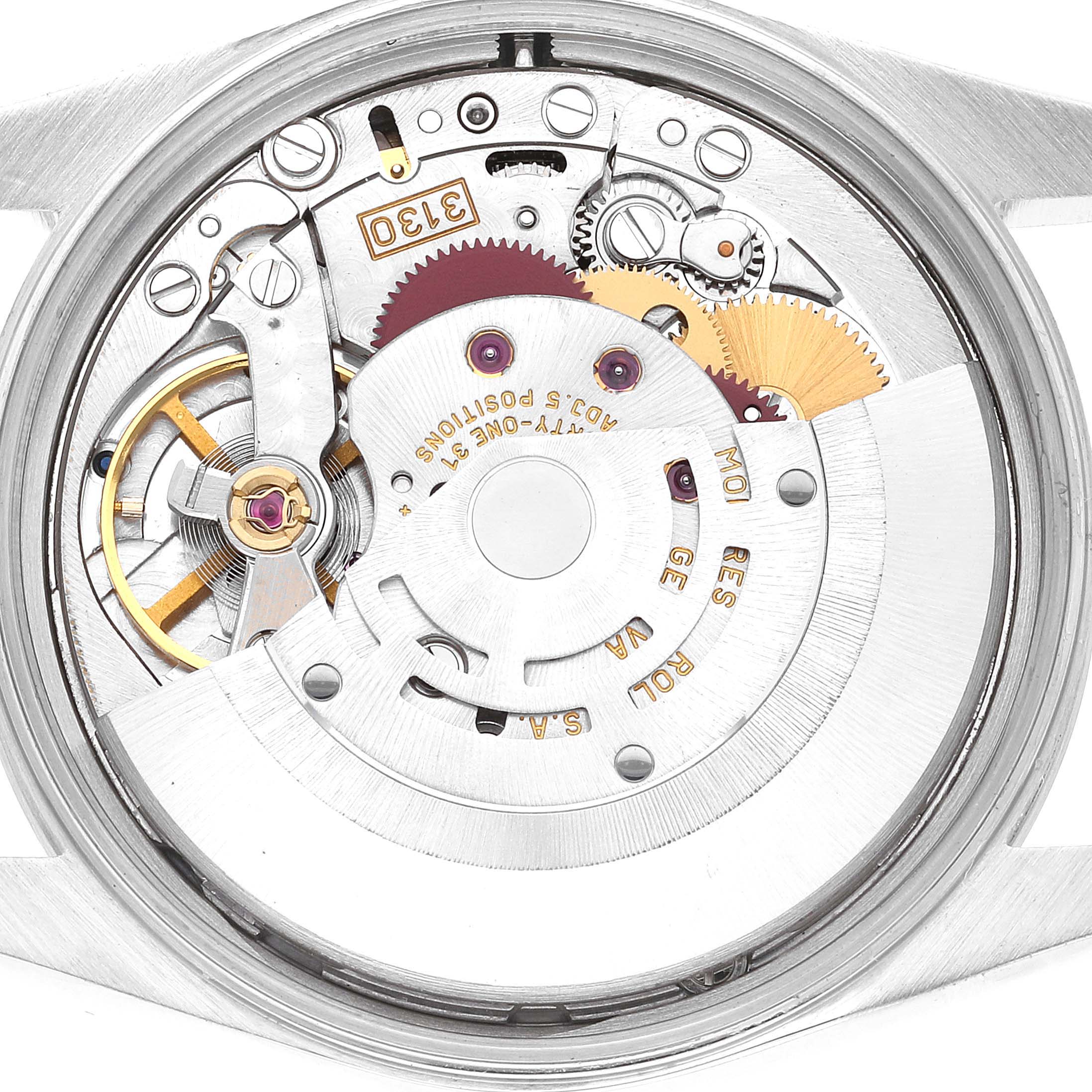 The image shows the internal mechanism of a Rolex Air-King 14000 Men's Stainless Steel Silver Dial 14000 Men's Stainless Steel Silver Dial watch from a rear angle, highlighting the gears and components.