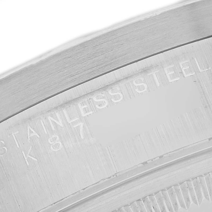 The image shows a close-up of the case back engraving on a Rolex Air-King 14010M Men's Stainless Steel Silver Dial 14010M Men's Stainless Steel Silver Dial watch, highlighting the stainless steel text.