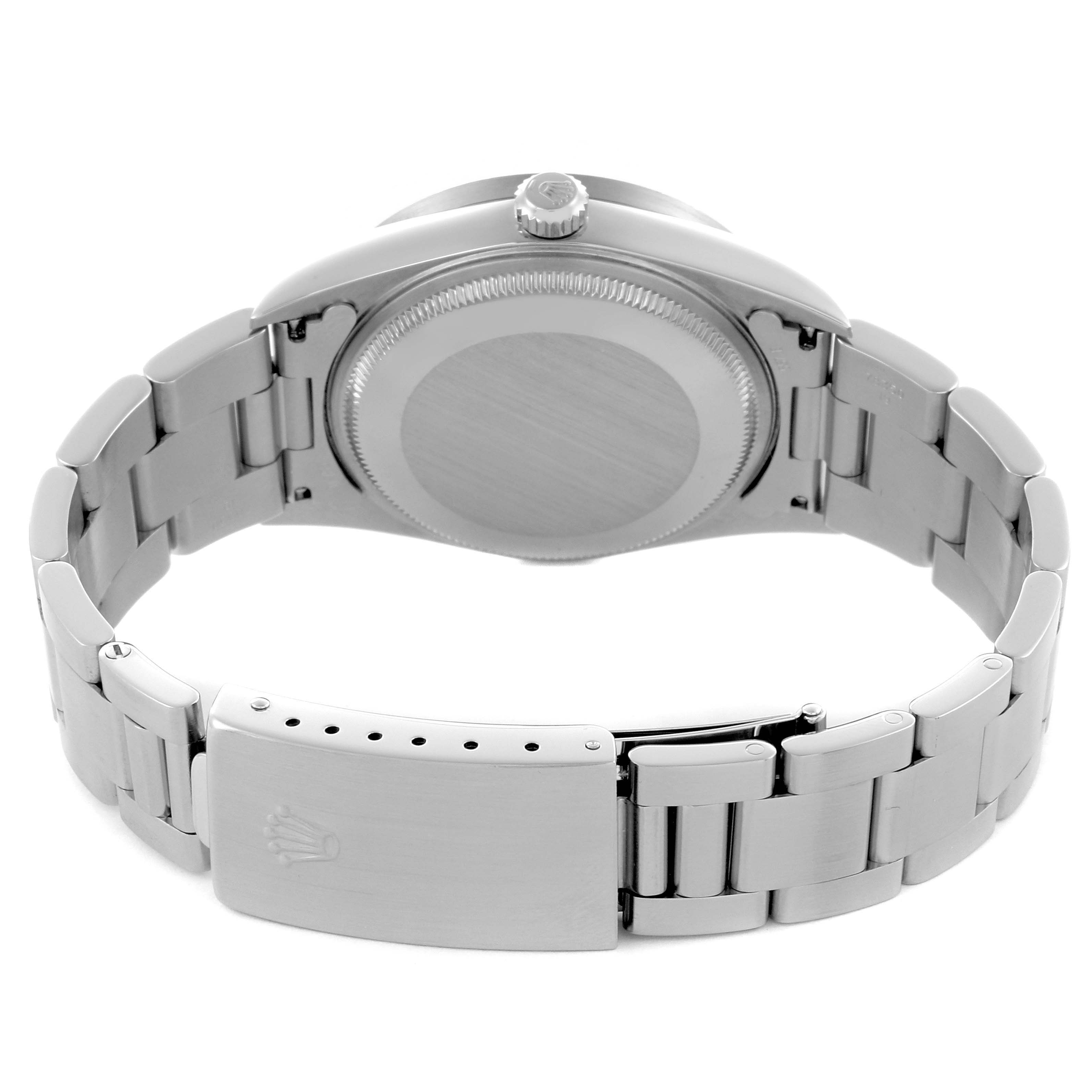 The Rolex Air-King 14010M Men's Stainless Steel Silver Dial 14010M Men's Stainless Steel Silver Dial watch is shown from the back, featuring the case back, crown, and bracelet clasp.