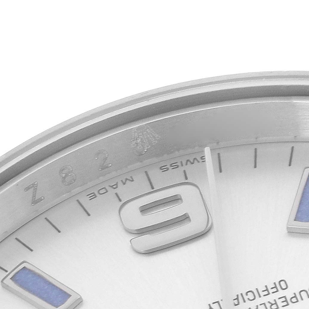 The image shows a close-up of the dial and bezel of the Rolex Air-King 114200 Men's Stainless Steel Silver Dial 114200 Men's Stainless Steel Silver Dial, highlighting the numerals and partial text.