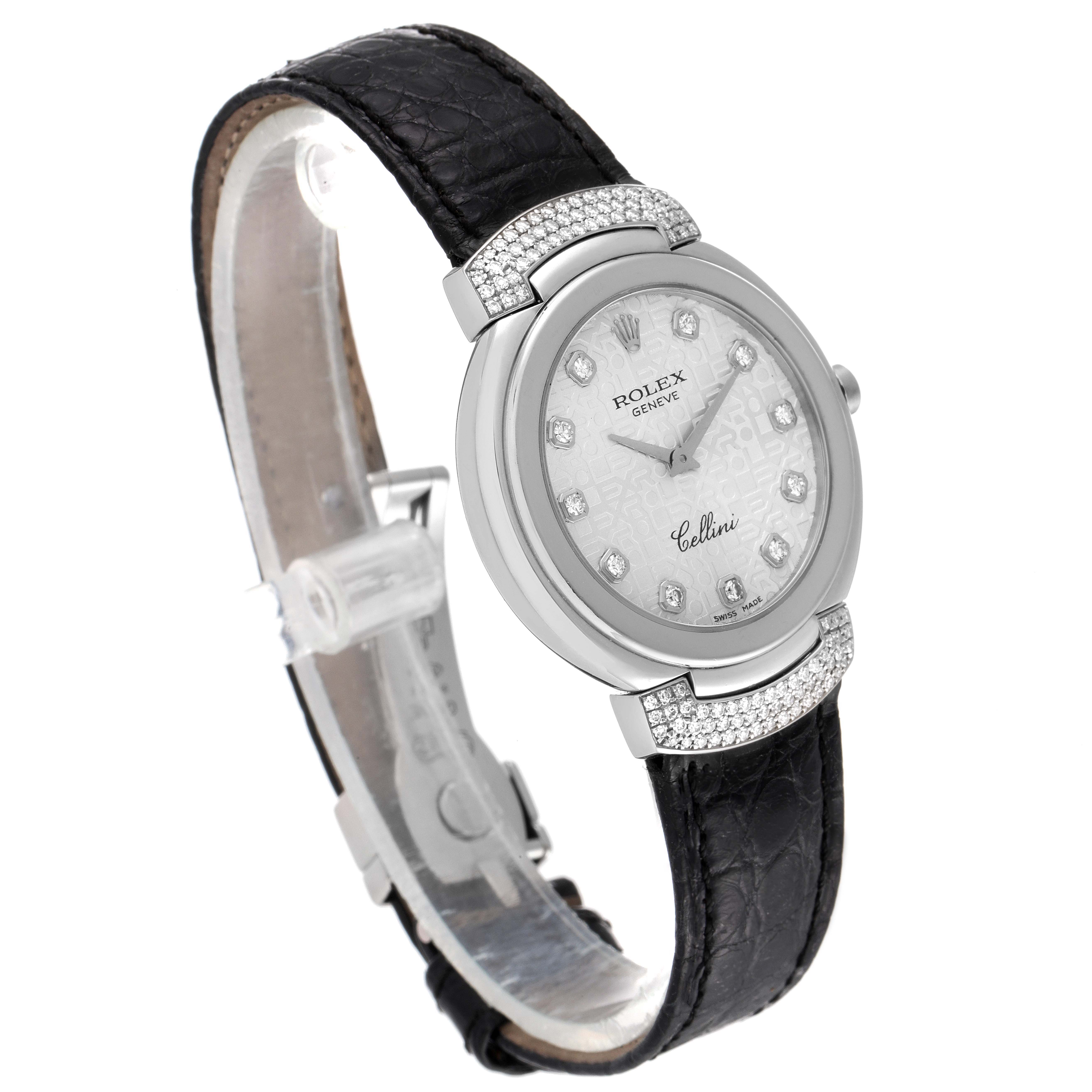 The Rolex Cellini 6682/9 Women's White Gold Silver Dial 6682/9 Women's White Gold Silver Dial watch is shown at an angle, highlighting its face, bezel, crown, and leather strap.