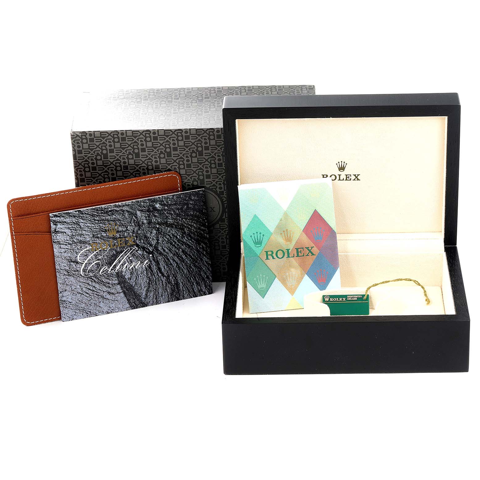 This image shows the box, documents, and accessories associated with the Rolex Cellini 6682/9 Women's White Gold Silver Dial 6682/9 Women's White Gold Silver Dial model, but not the watch itself.