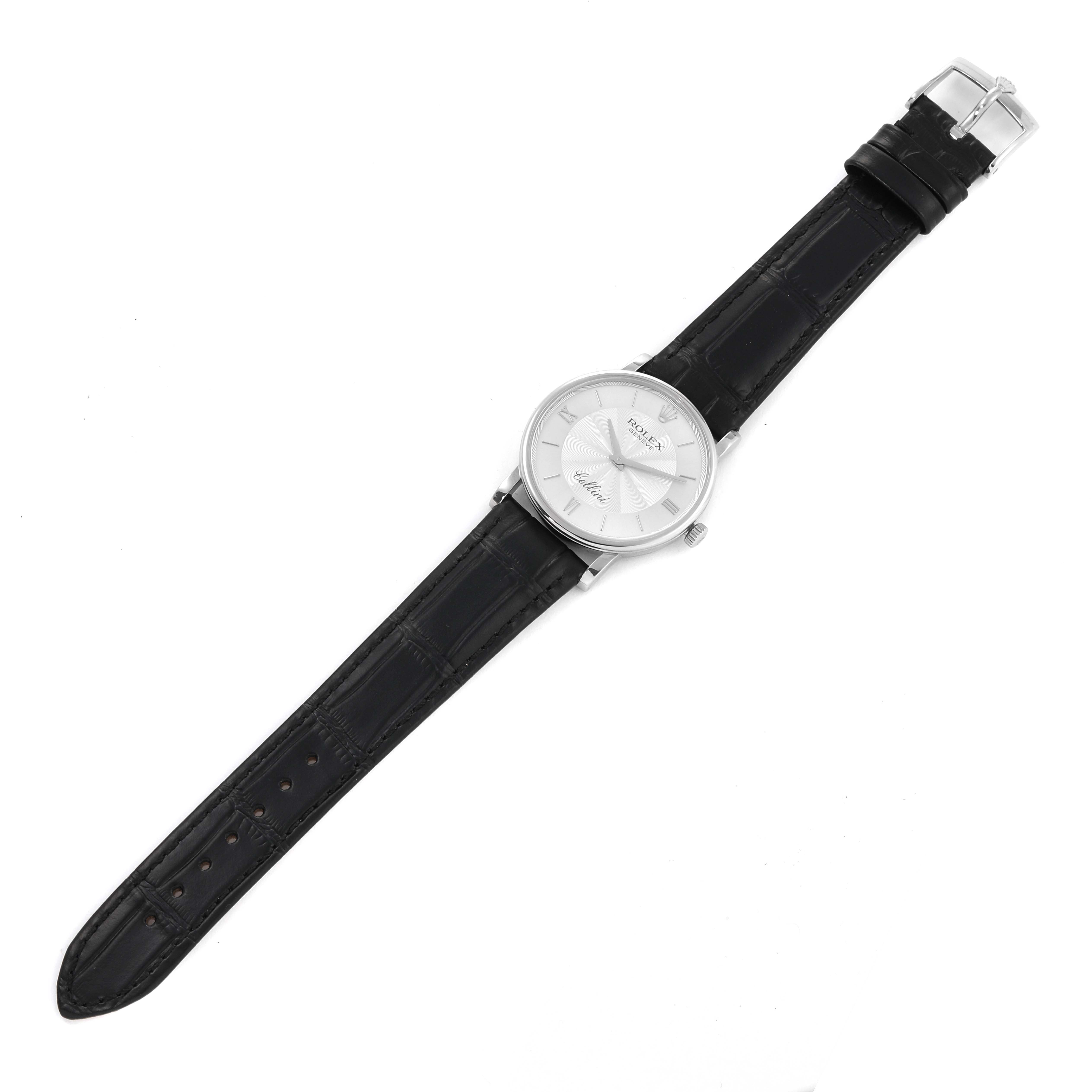 This image shows a full top-down view of a Rolex Cellini 5115/9 Men
s White Gold Silver Dial 5115/9 Men
s White Gold Silver Dial watch with a black leather strap and silver dial.