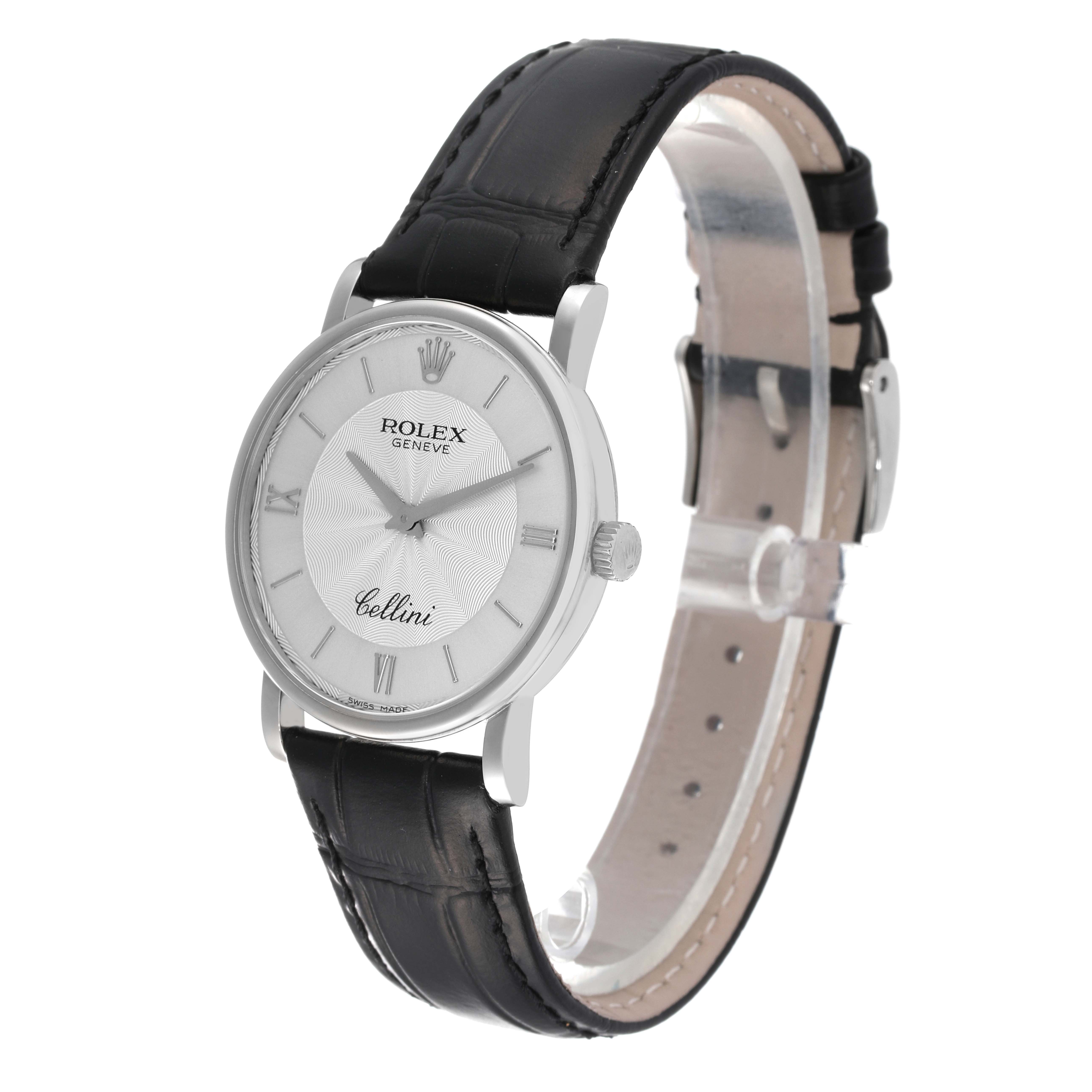 The image shows a Rolex Cellini 5115/9 Men
s White Gold Silver Dial 5115/9 Men
s White Gold Silver Dial watch angled to display the face, crown, and leather strap.