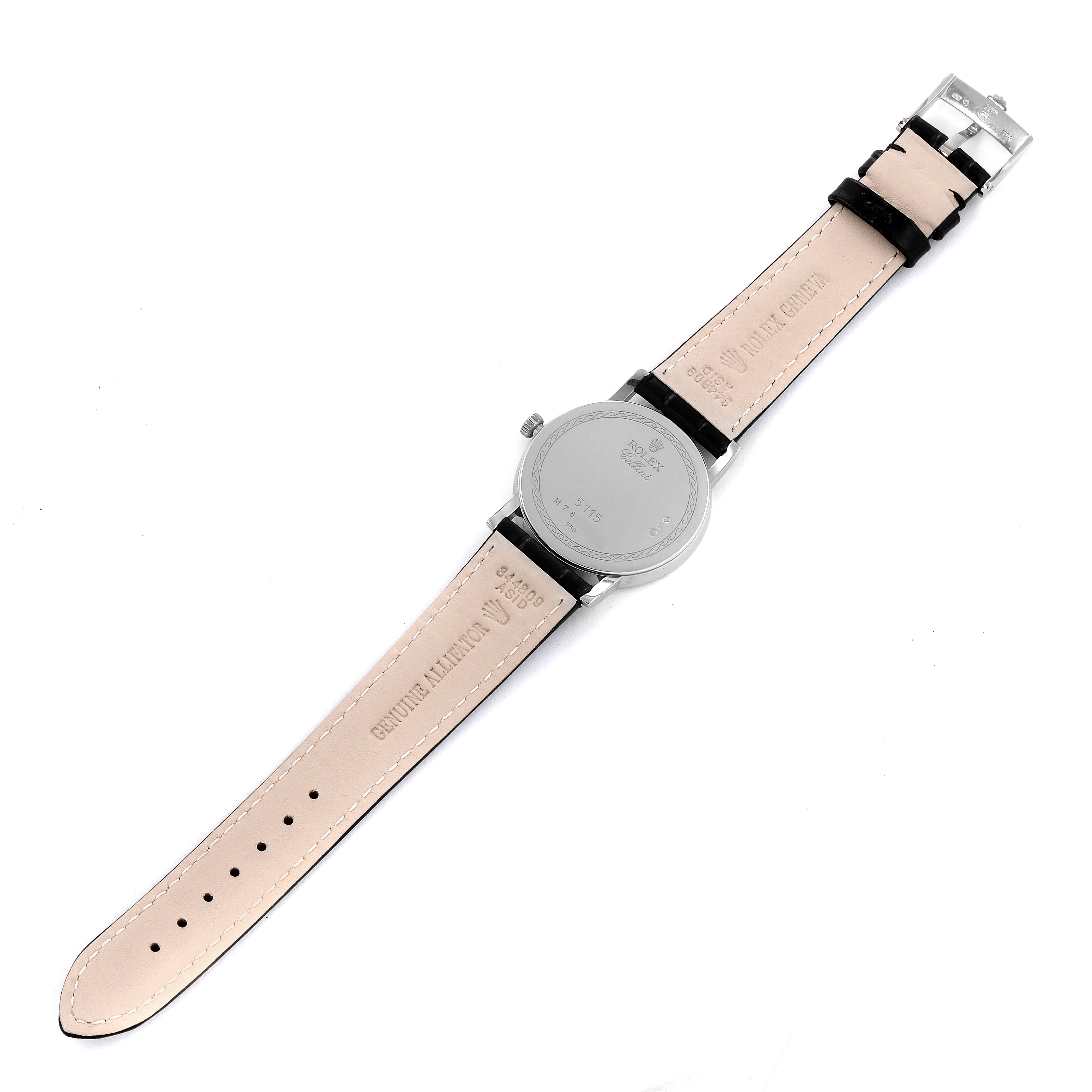 The image shows the back view of a Rolex Cellini 5115/9 Men
s White Gold Silver Dial 5115/9 Men
s White Gold Silver Dial watch, highlighting the case back and the leather strap with its buckle.