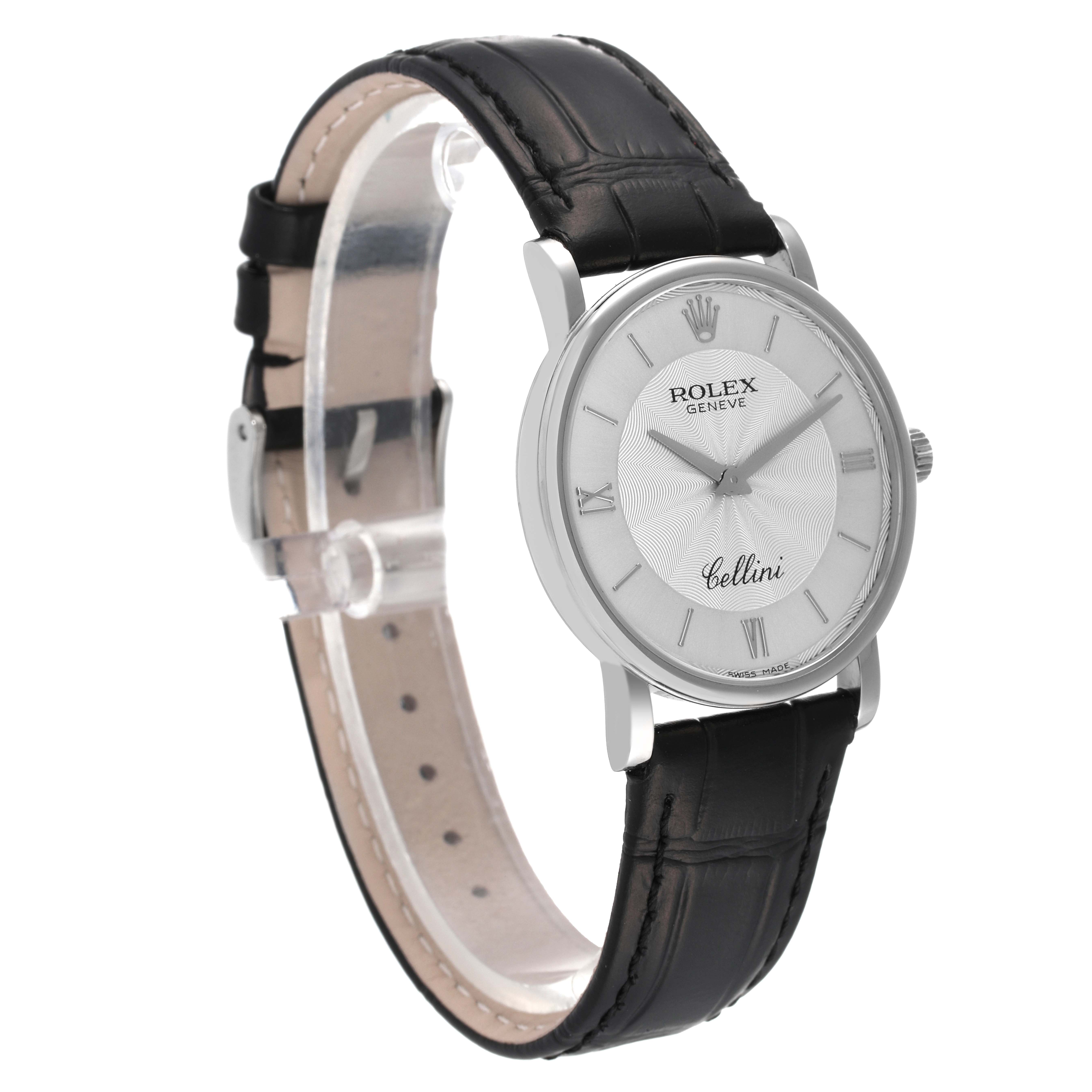 The Rolex Cellini 5115/9 Men
s White Gold Silver Dial 5115/9 Men
s White Gold Silver Dial watch is shown at a slight angle, displaying its face, black leather strap, and side profile.