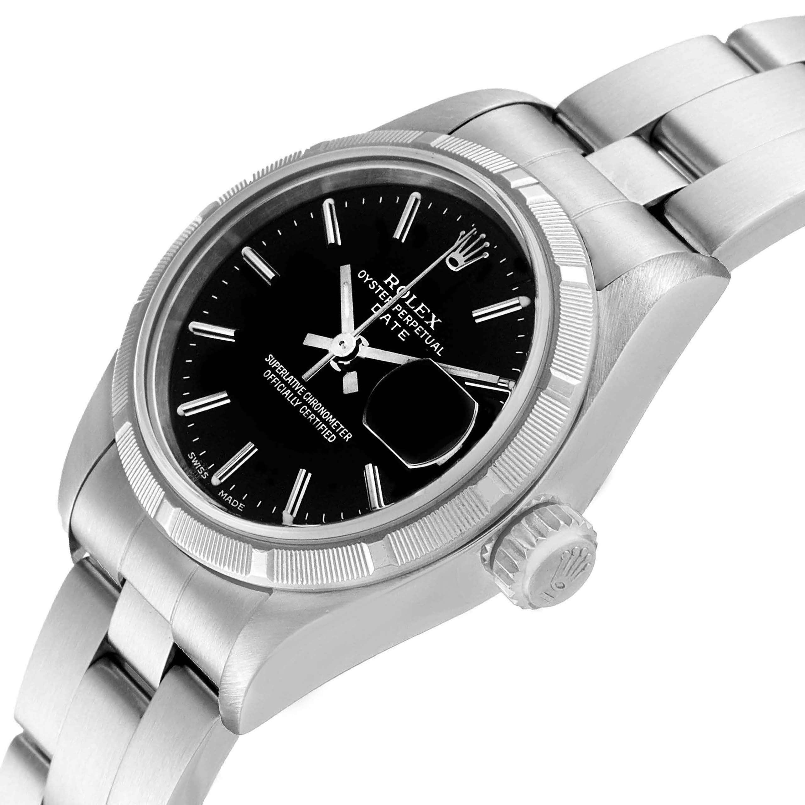 This image shows a side angle of the Rolex Date 79190 Women's Stainless Steel Black Dial 79190 Women's Stainless Steel Black Dial model watch, highlighting the dial, bezel, crown, and part of the bracelet.