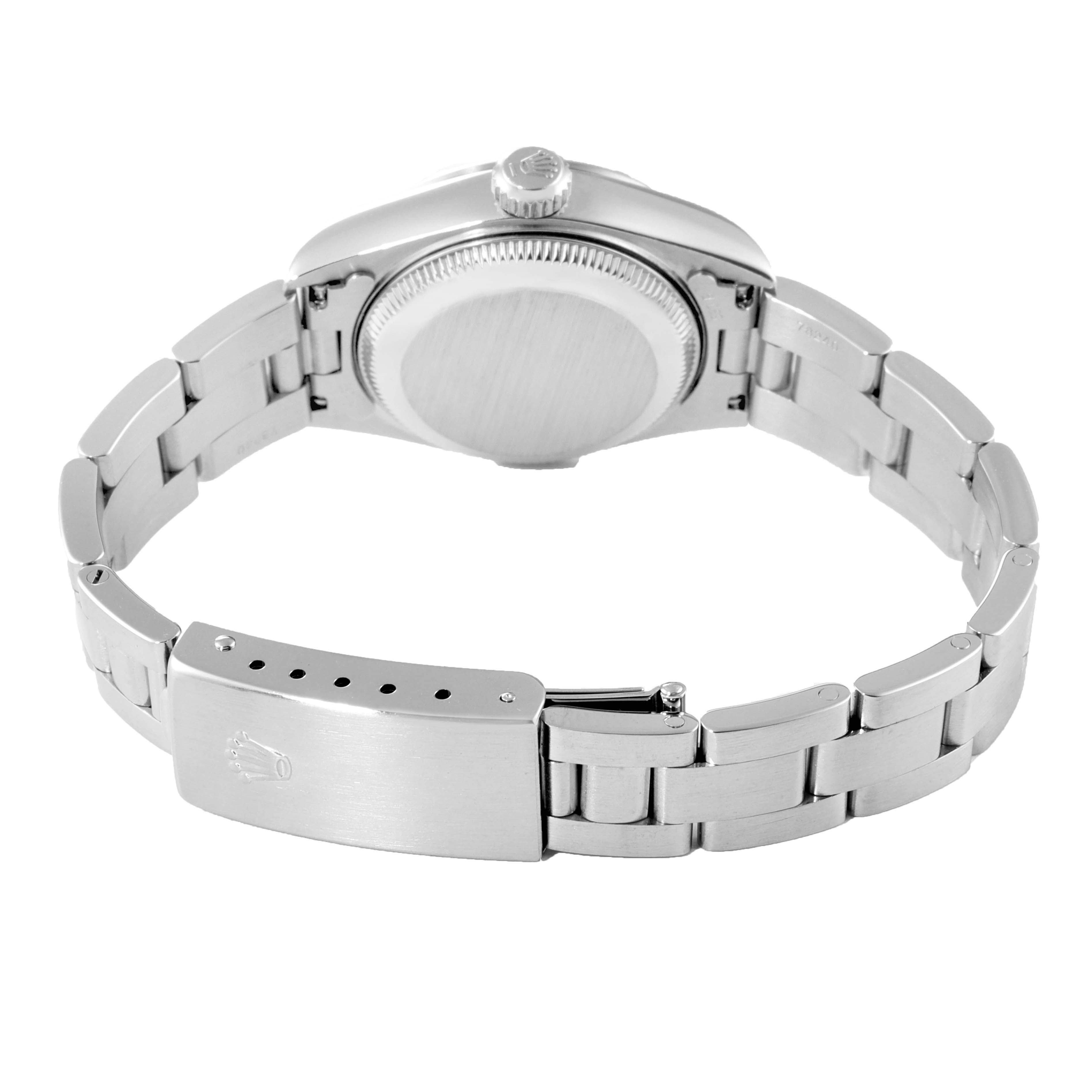 The image shows the back view of a Rolex Date 79190 Women's Stainless Steel Black Dial 79190 Women's Stainless Steel Black Dial watch, highlighting its stainless steel case, bracelet, and clasp.