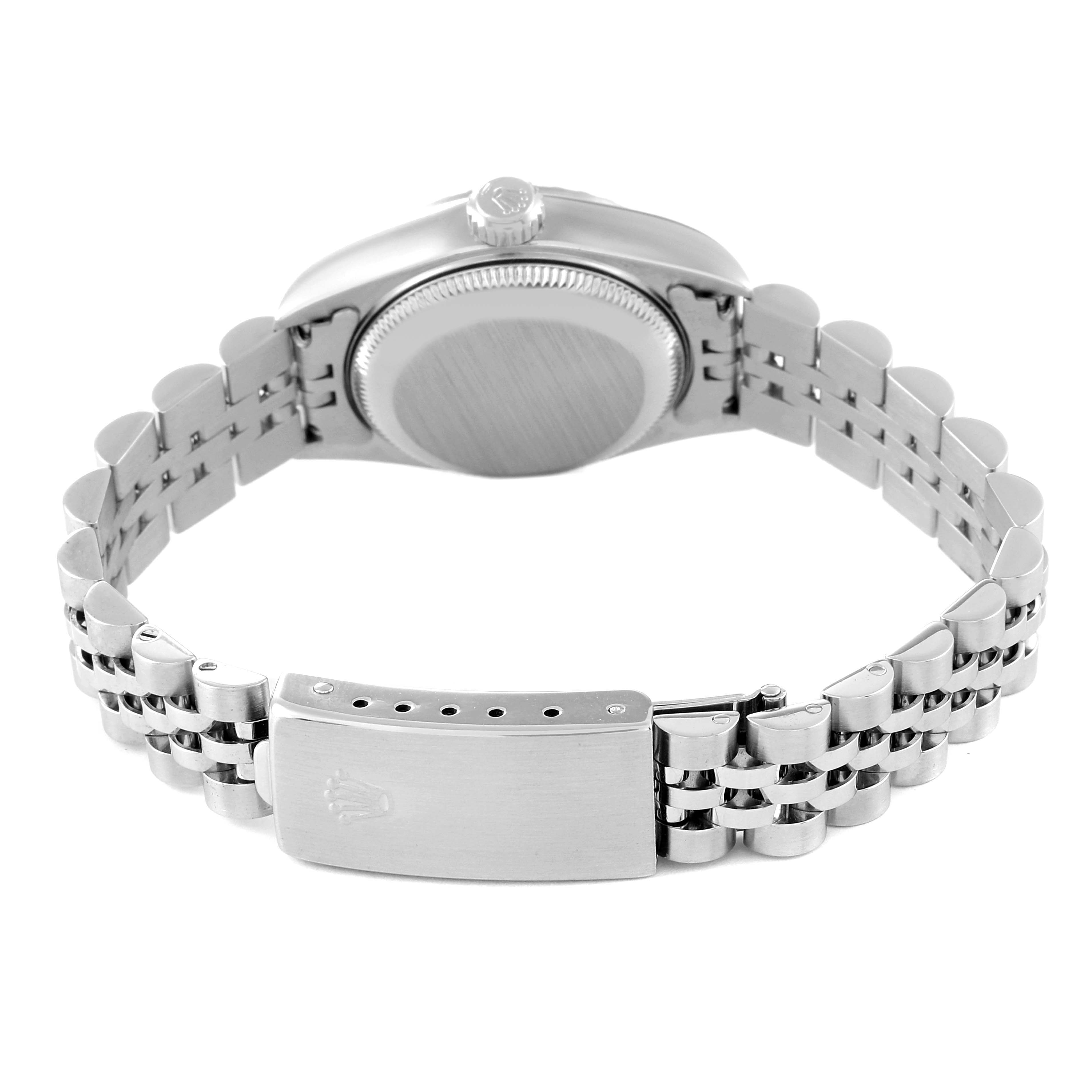 The image shows the back of the Rolex Date 79240 Women's Stainless Steel Pink Dial 79240 Women's Stainless Steel Pink Dial model watch, including the caseback, crown, and bracelet with clasp.